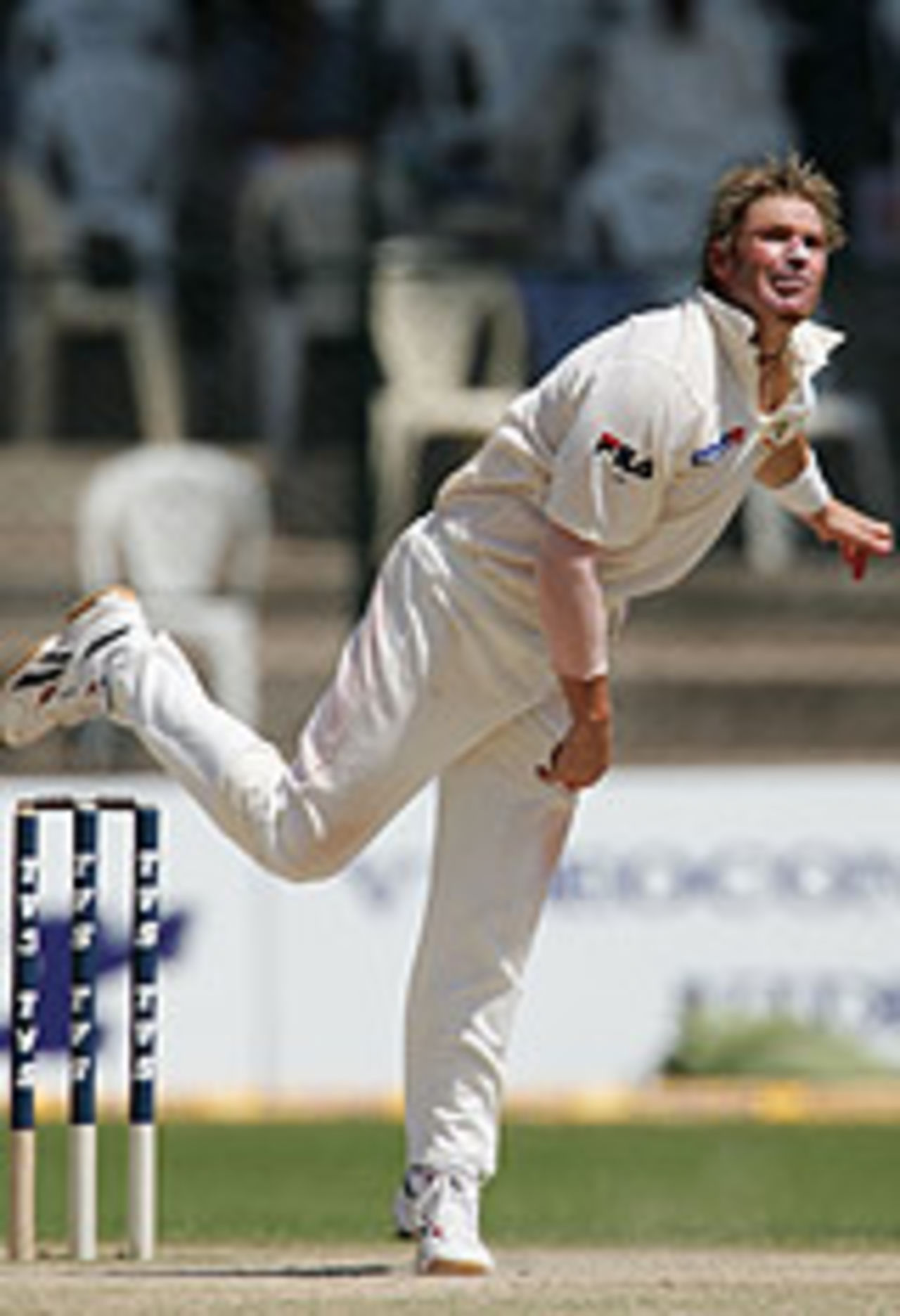 Shane Warne hurls a delivery on a wearing pitch, India v Australia, 1st Test, Bangalore, 3rd day, October 8, 2004
