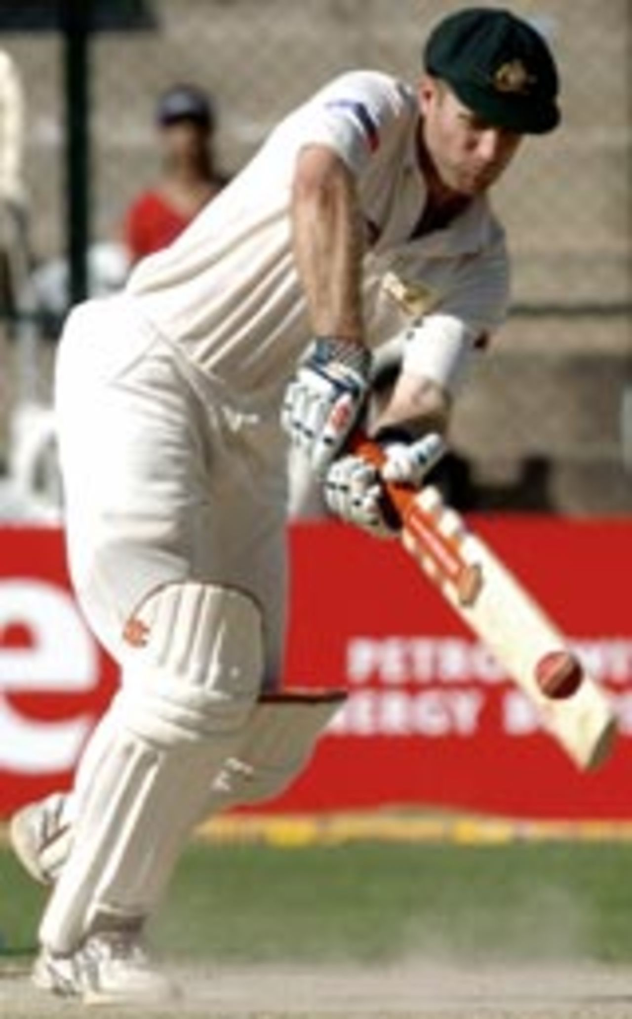 Simon Katich crunches a stroke on the on-side, India v Australia, 1st Test, Bangalore, 3rd day, October 8, 2004