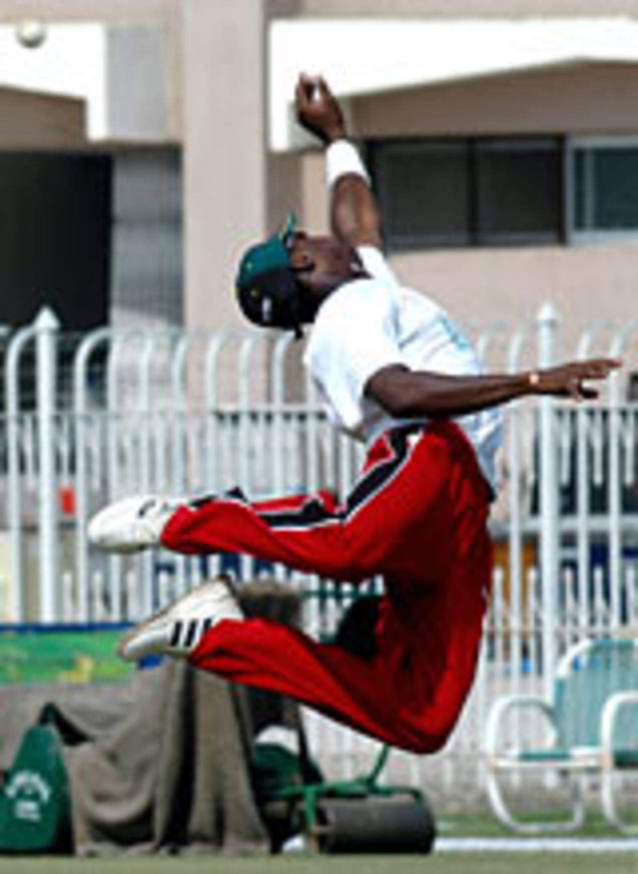 Elton Chigumbura dives during a practice session at Rawalpindi, October 8, 2004