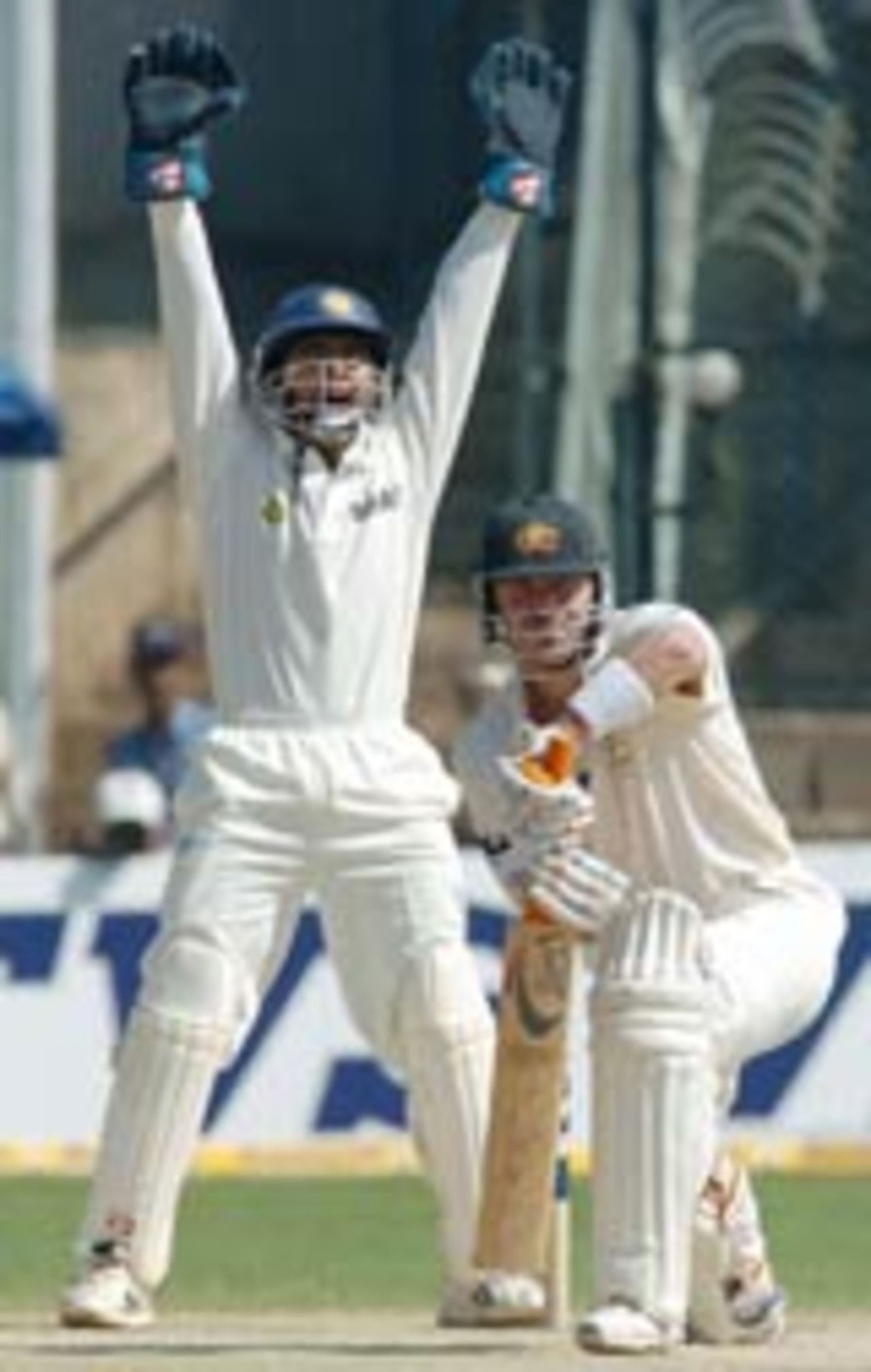 Damien Martyn defends, India v Australia, 1st Test, Bangalore, 3rd day, October 8, 2004