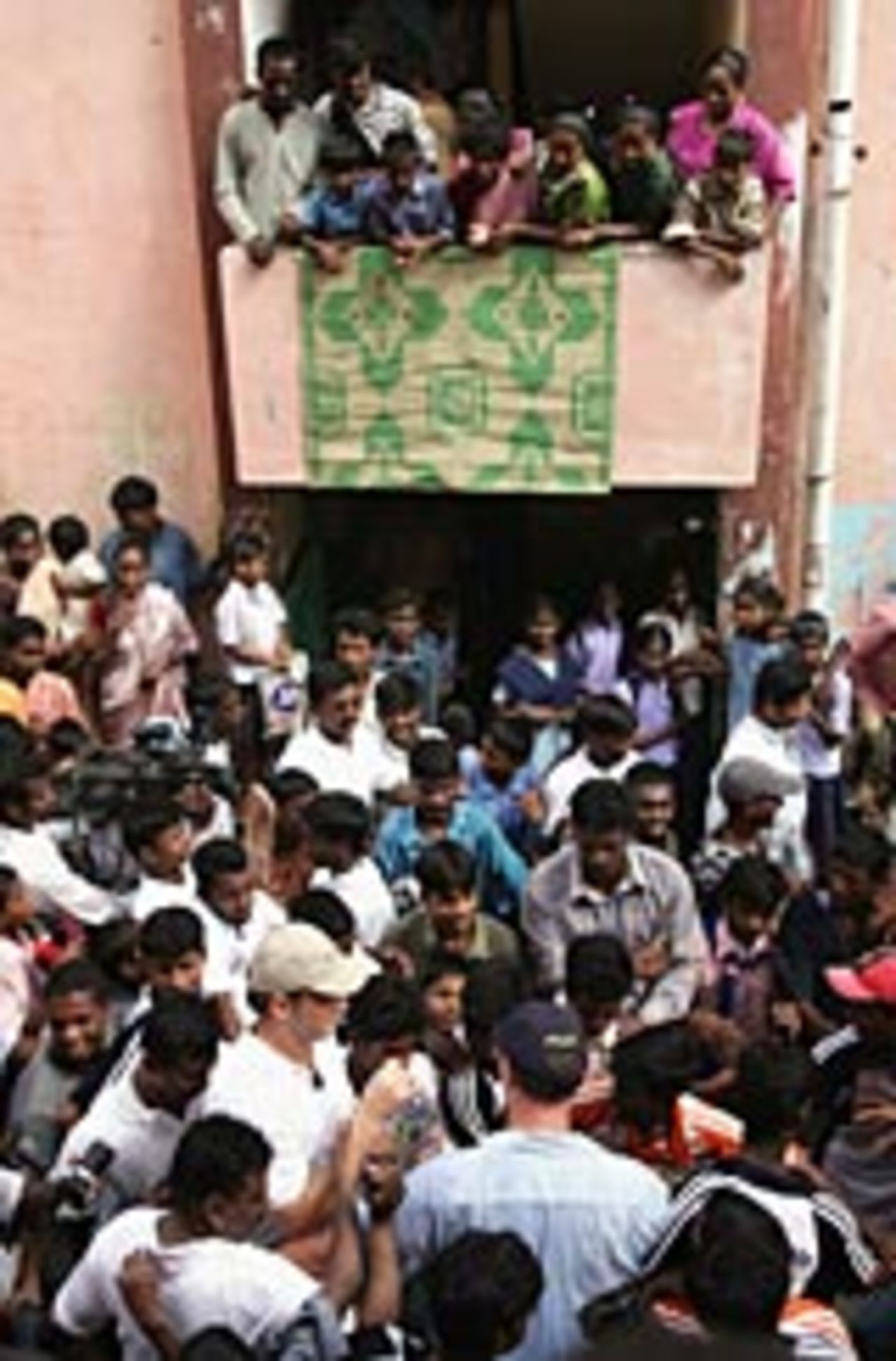 Adam Gilchrist  meets some locals in Chennai, October 11, 2004