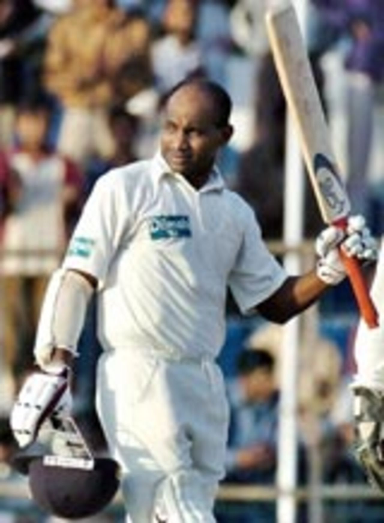 Sanath Jayasuriya acknowledges the cheers after scoring his hundred, Pakistan v Sri Lanka, 1st Test, Faisalabad, October 22, 2004