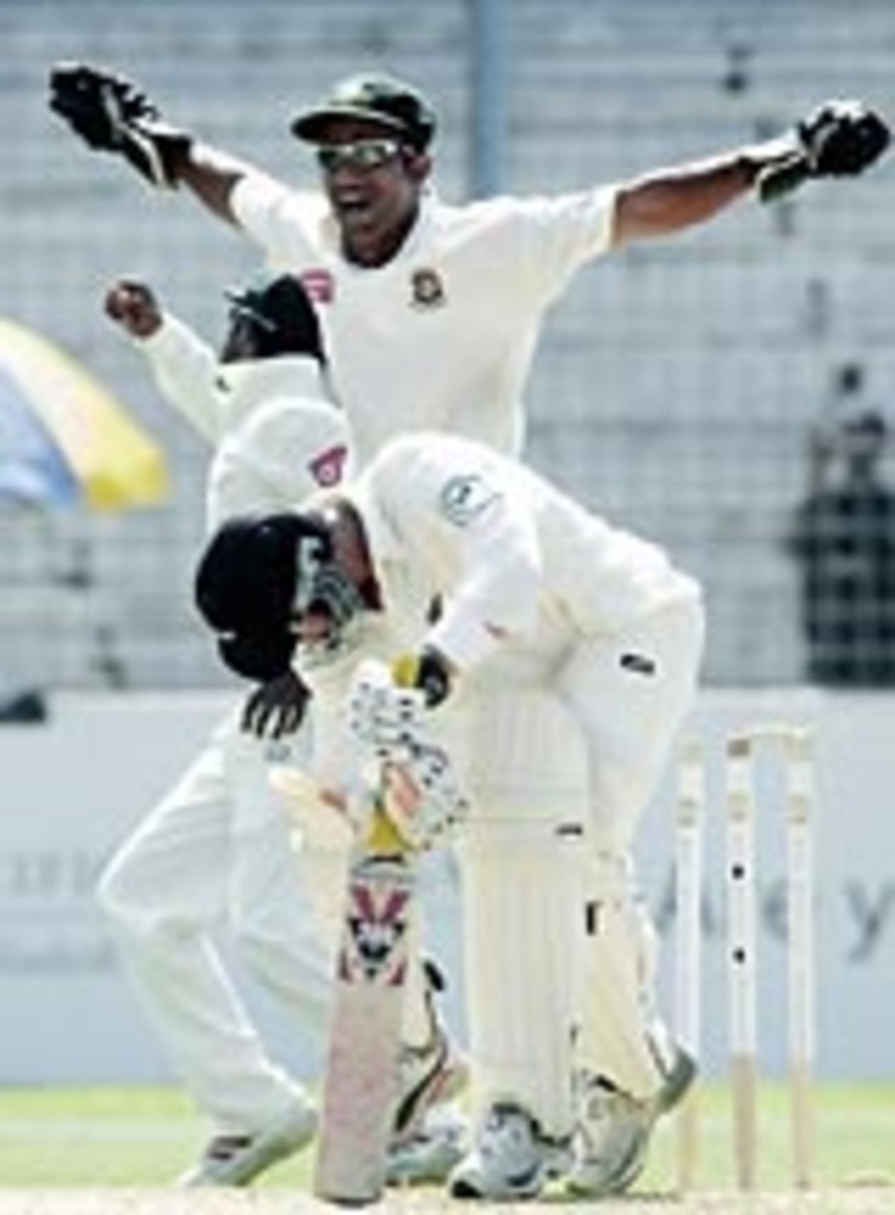 Khaled Mashud celebrates the dismissal of Matthew Sinclair, Bangladesh v New Zealand, Chittagong, October 26, 2004