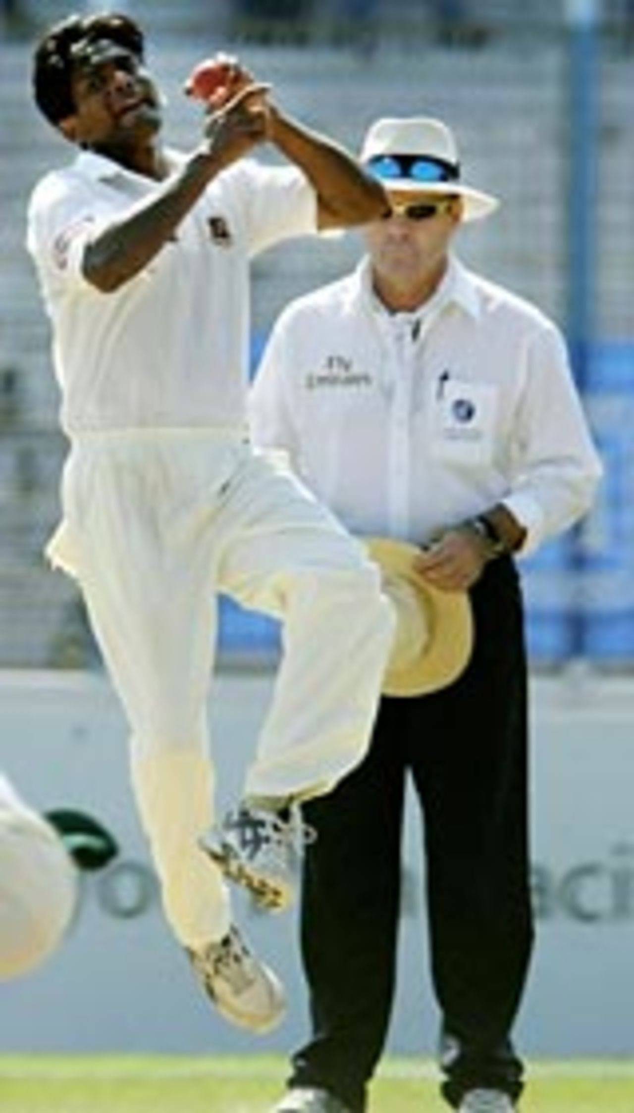 Mohammad Rafique bowling against New Zealand, October 2004
