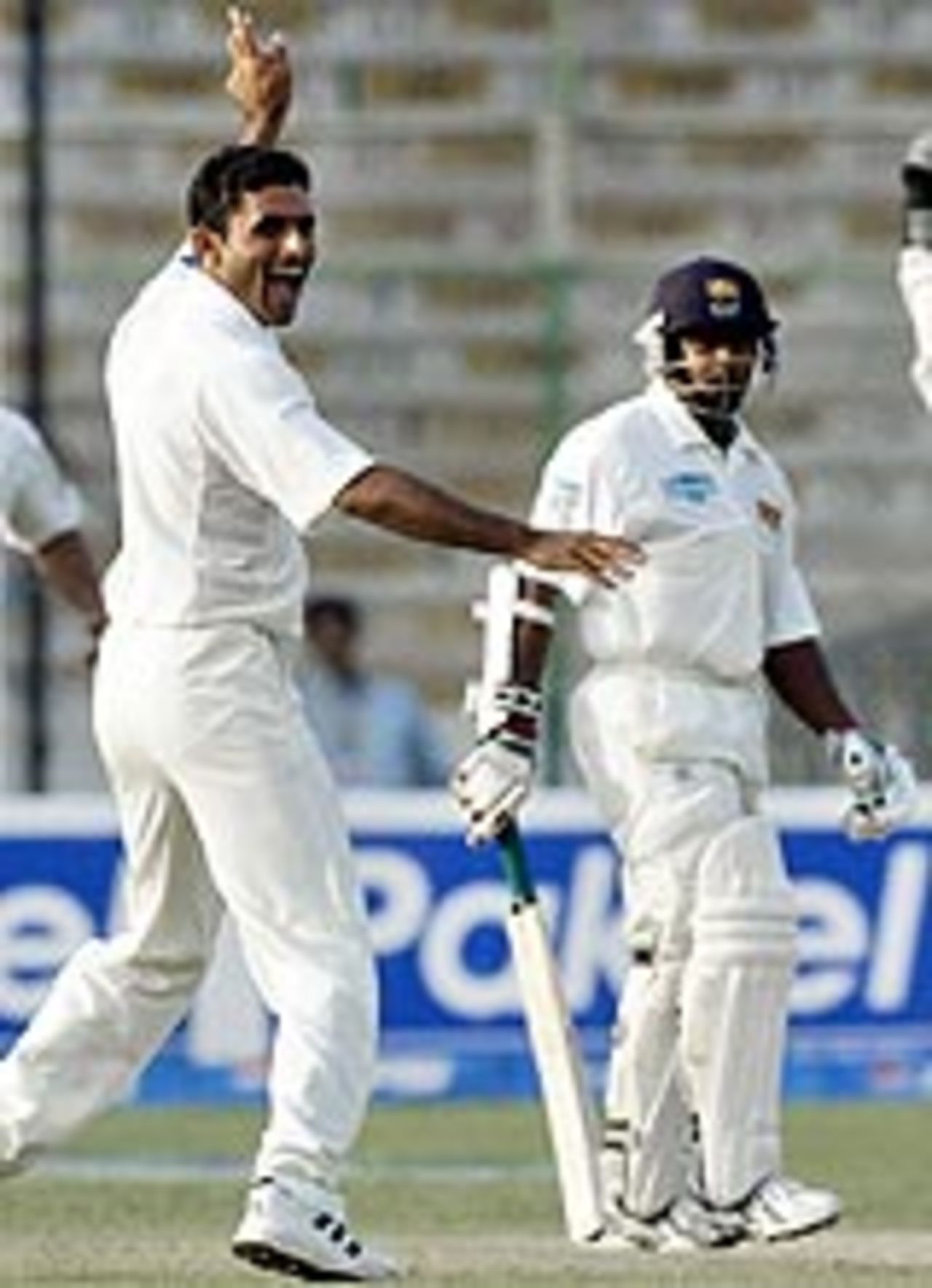 Abdul Razzaq grabs another of his five wickets, Pakistan v Sri Lanka, 2nd Test, Karachi, 1st day, October 28, 2004