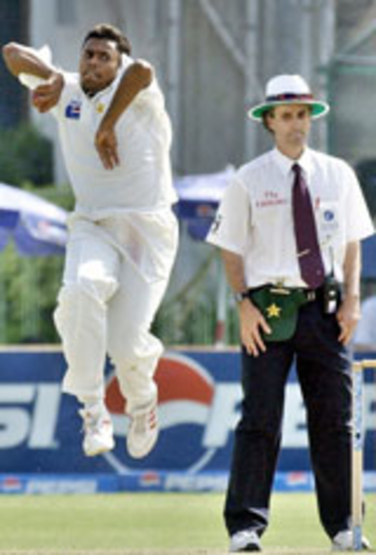 Danish Kaneria bowling from the pavilion end on the fourth day of the second Test against Sri Lanka at Karachi, Oct 31 2004