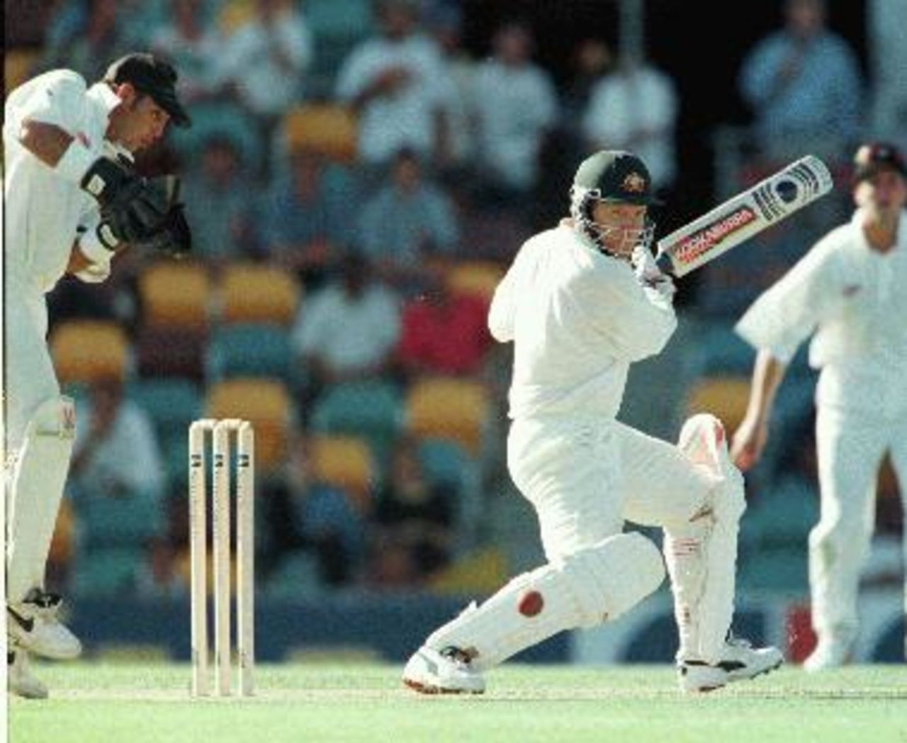 Ian Healy cuts on his way to a 50 during the first day of the Australia v New Zealand Test at the Gabba, 7 11 Nov 1997
