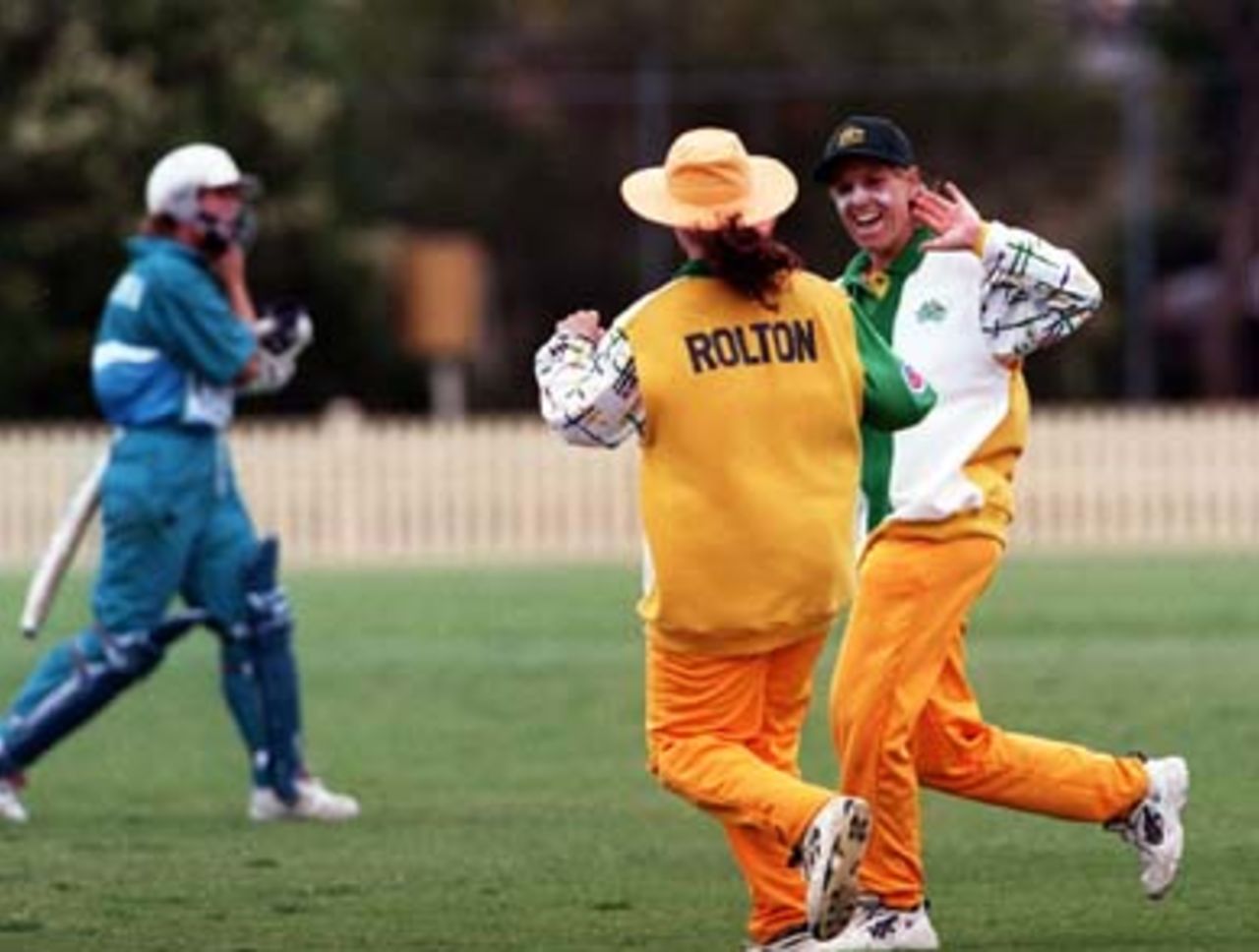 Joanne Broadbent (right) congratulates her fellow South Australian Karen Rolton on taking the first catch of the NZ innings . Aust v NZ 3rd ODI at Memorial Oval, Bankstown, Sydney Saturday November 8th 1997.