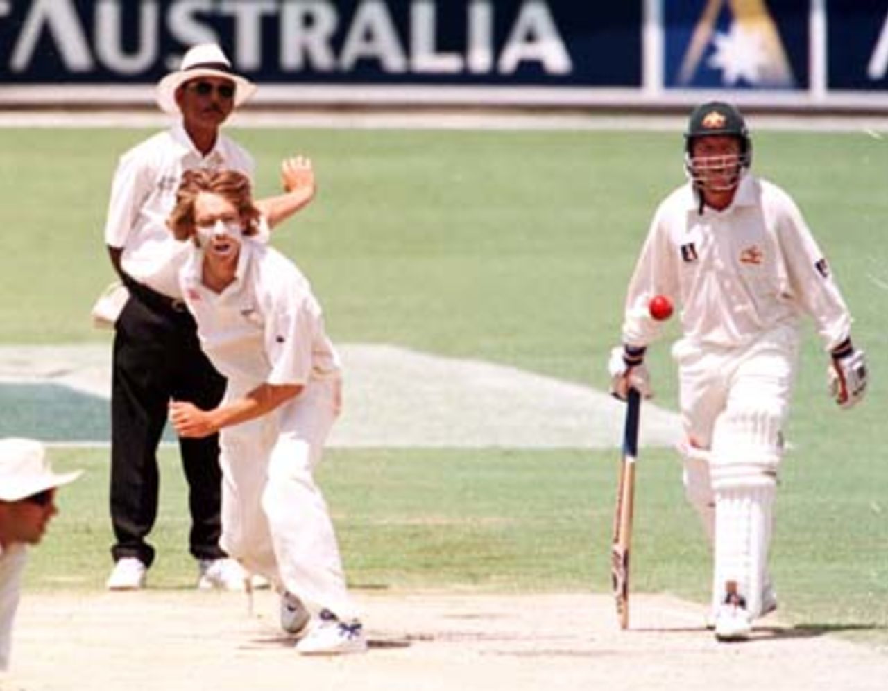 Daniel Vettori bowls during the 4th day of the 1st Test between Australia and New Zealand at the Gabba, 7 - 11 Nov 1997