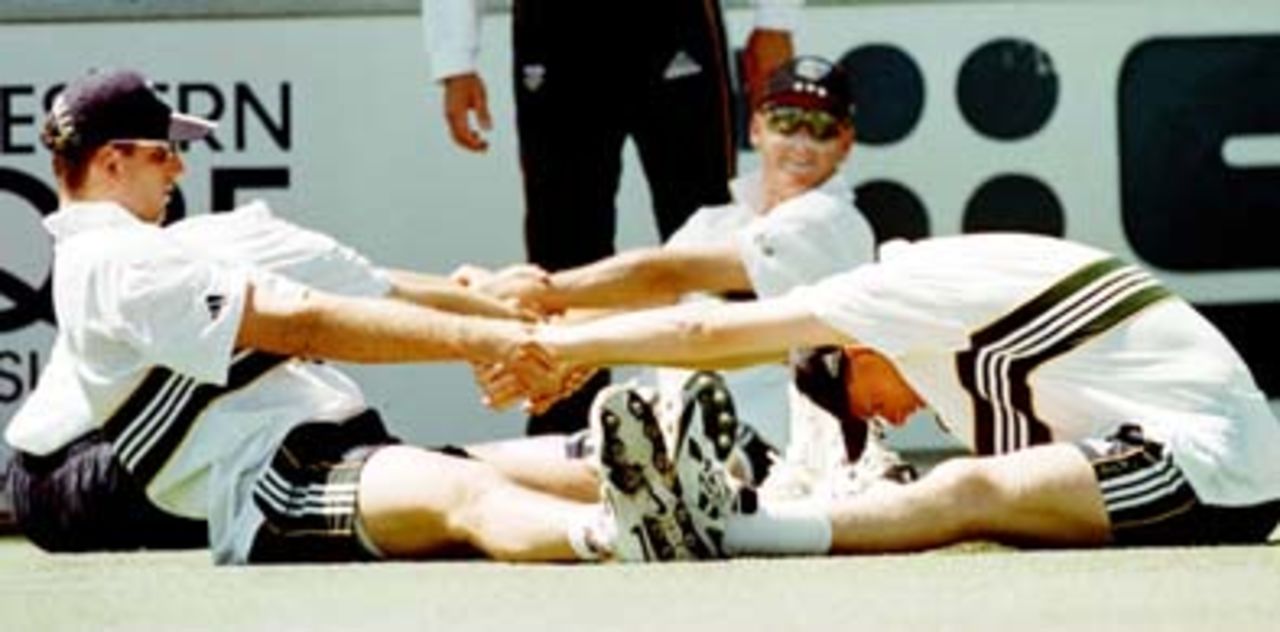 New boy, Simon Cook (RIGHT) is stretched by fellow paceman, Kaprowicz.Aust team practice at the WACA, Perth, Wednesday November 19th 1997.