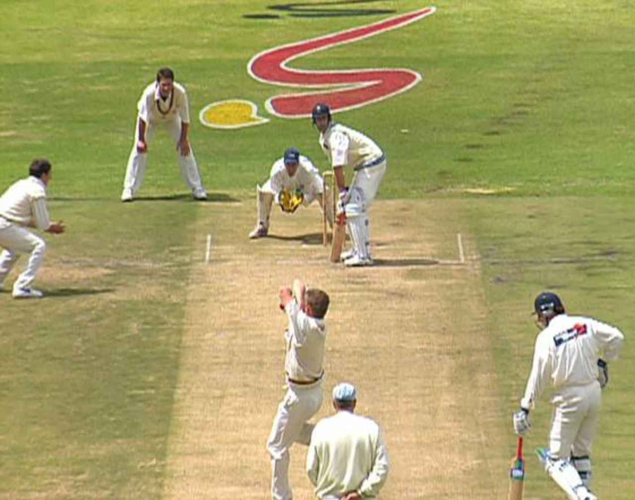 Clive Eksteen bowls to John Commins during the SuperSport Series match between Gauteng and Western Province. Nic Pothas is the 'keeper, with Stefan Jacobs and Ken Rutherford the close-in fielders. The non-striker is Eric Simons.