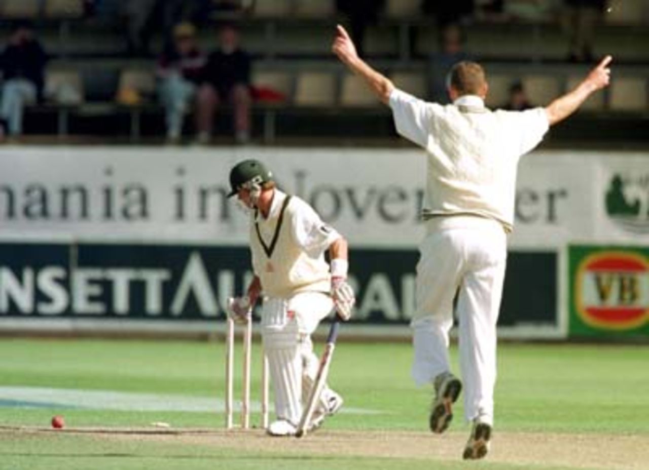 Greg Blewett looks in disbelief as he is bowled by Simon Doull while on 99 during the 2nd day of the 3rd Test between Australia and New Zealand at Bellerive Oval in Tasmania. 28 November 1997.