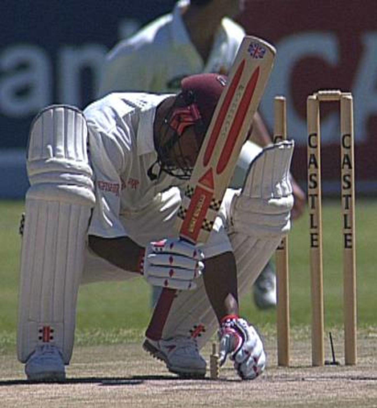 Leon Garrick marks his guard on day 1 of the 4-day match between West Indies A and Western Province at Newlands, 28 Nov 1997.