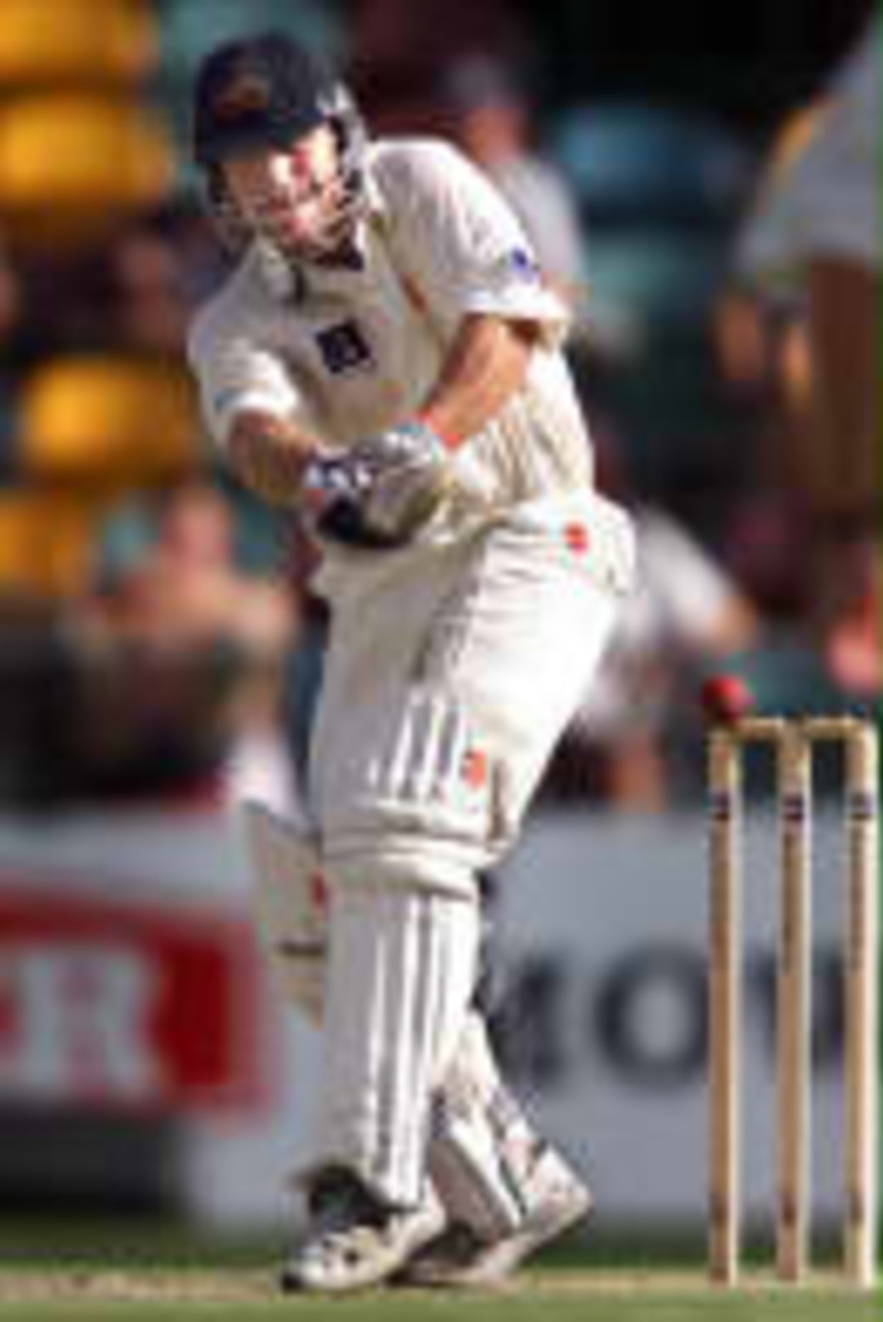 Australia opening batsman Michael Slater lofts a ball away on his way to a quick-fire century on the fourth day of the first Ashes Test being played at the Gabba in Brisbane 23 November, 1998. Australia has set England 348 runs for victory and at stumps are 26-0, setting a the match up for a thrilling final day.