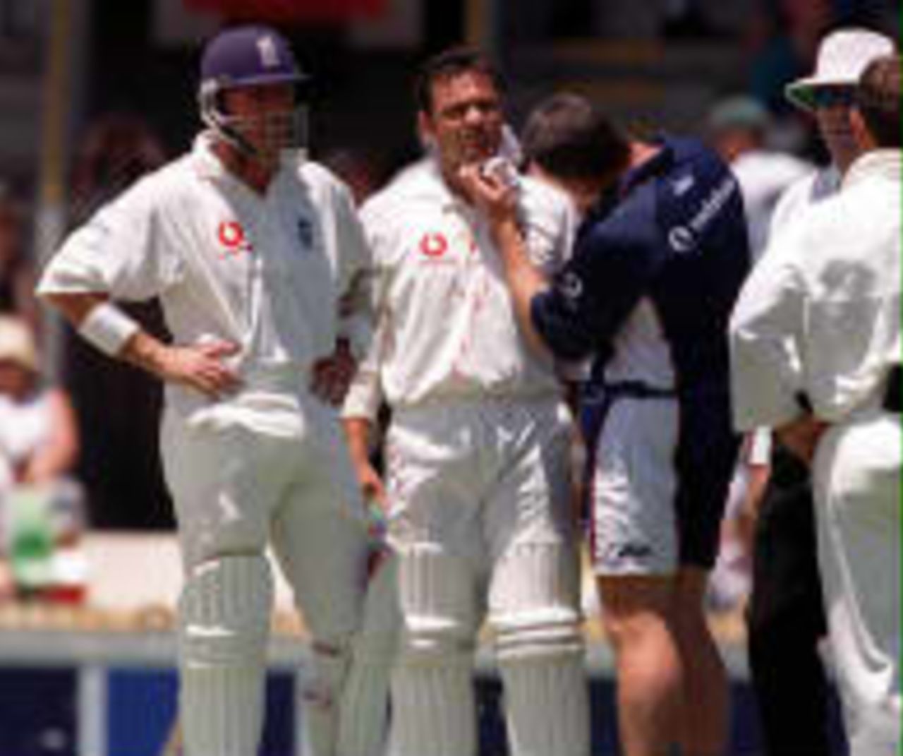 Ramprakash is checked by the team doctor after he was hit by a McGrath bouncer The Ashes, 1998/99, 2nd Test Australia v England WACA Ground, Perth 28 November