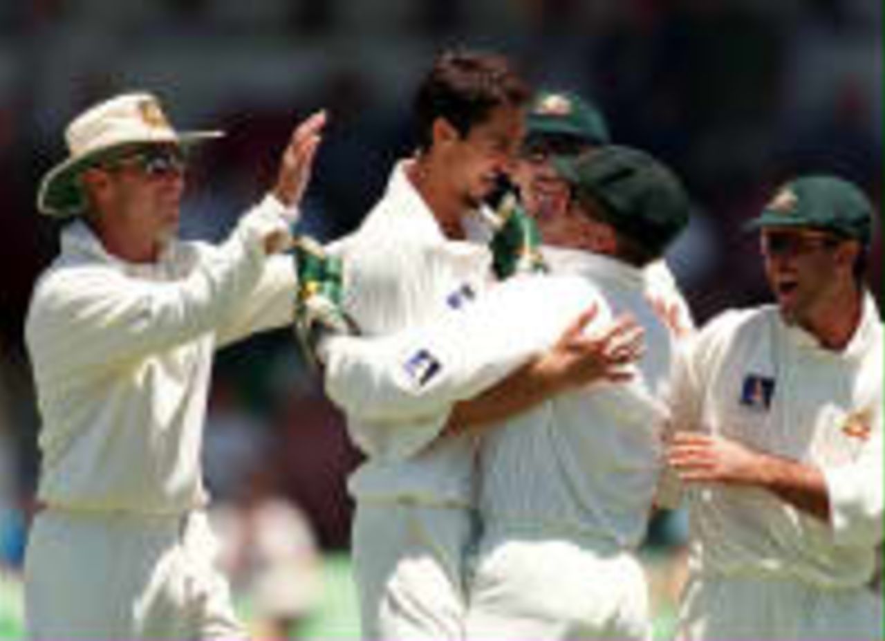 Gillespie is congratulated by Ian Healy after he takes the final England wicket The Ashes, 1998/99, 2nd Test Australia v England WACA Ground, Perth 28,29,30 November 1998