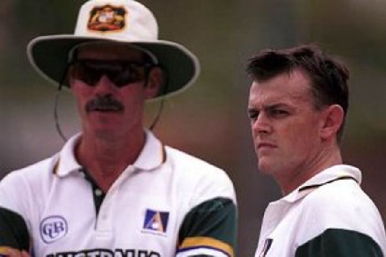 4 Nov 1999: New coach John Buchanan of Australia on the left and wicktkeeper Adam Gilchrist look on during net practice ahead of the First Test Match against Pakistan at The Gabba, Brisbane, Australia.