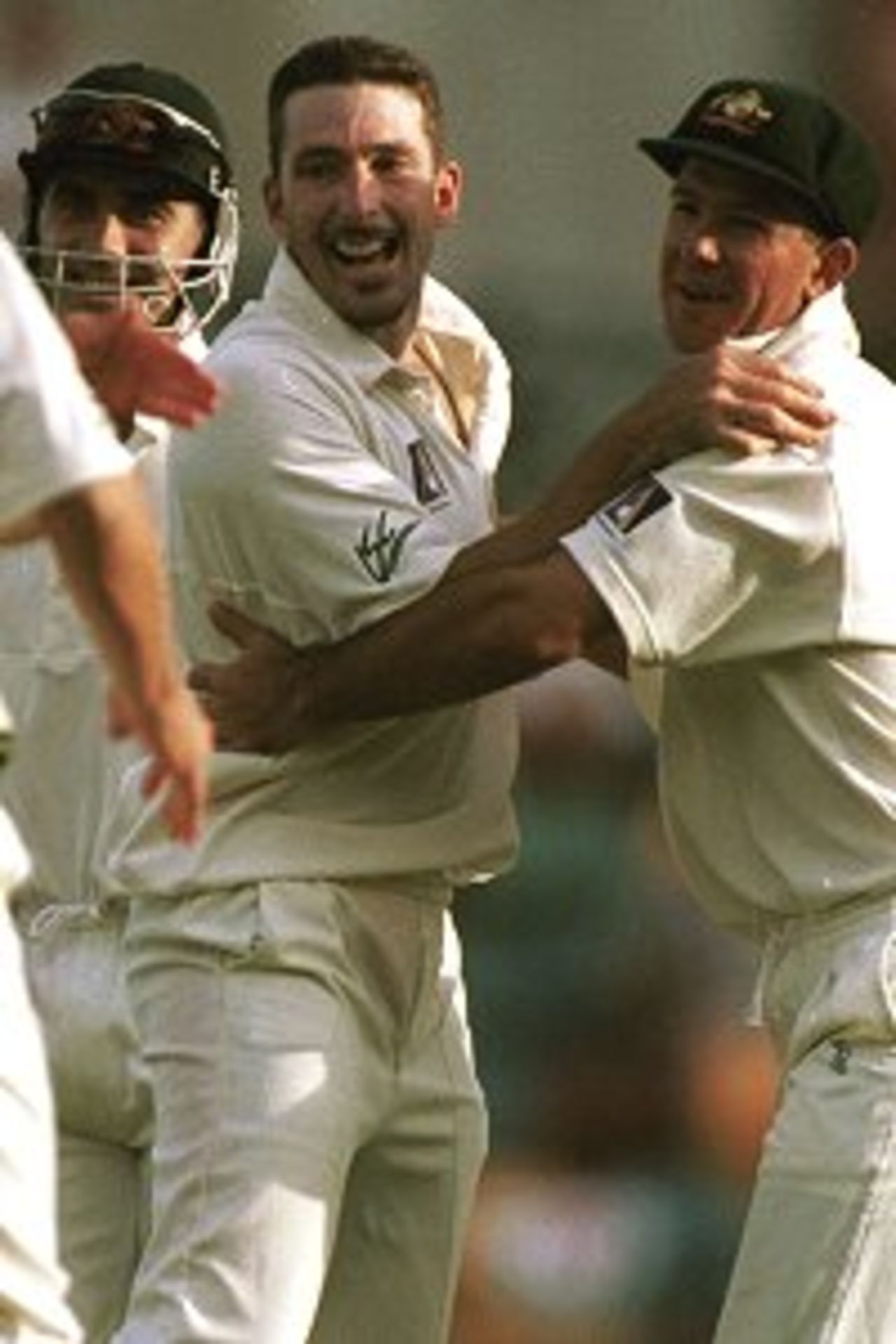 Fleming celebrates a wicket with his teammates