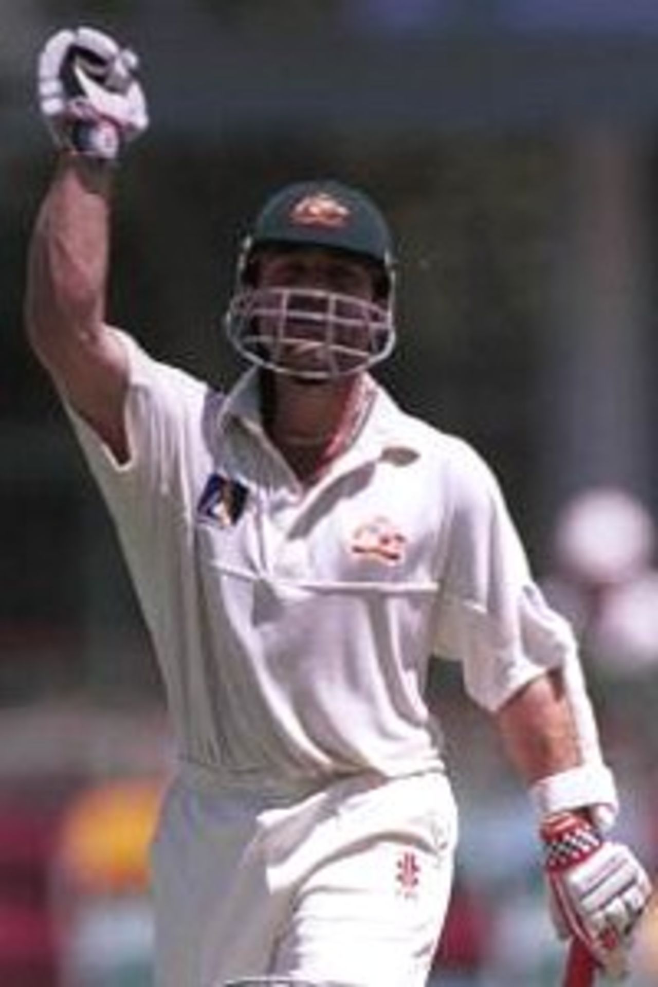 Man of the match Michael Slater pumps his fist with delight after hitting the winning runs in Australia's comprehensive 10-wicket victory over Pakistan in the first Test at the Gabba