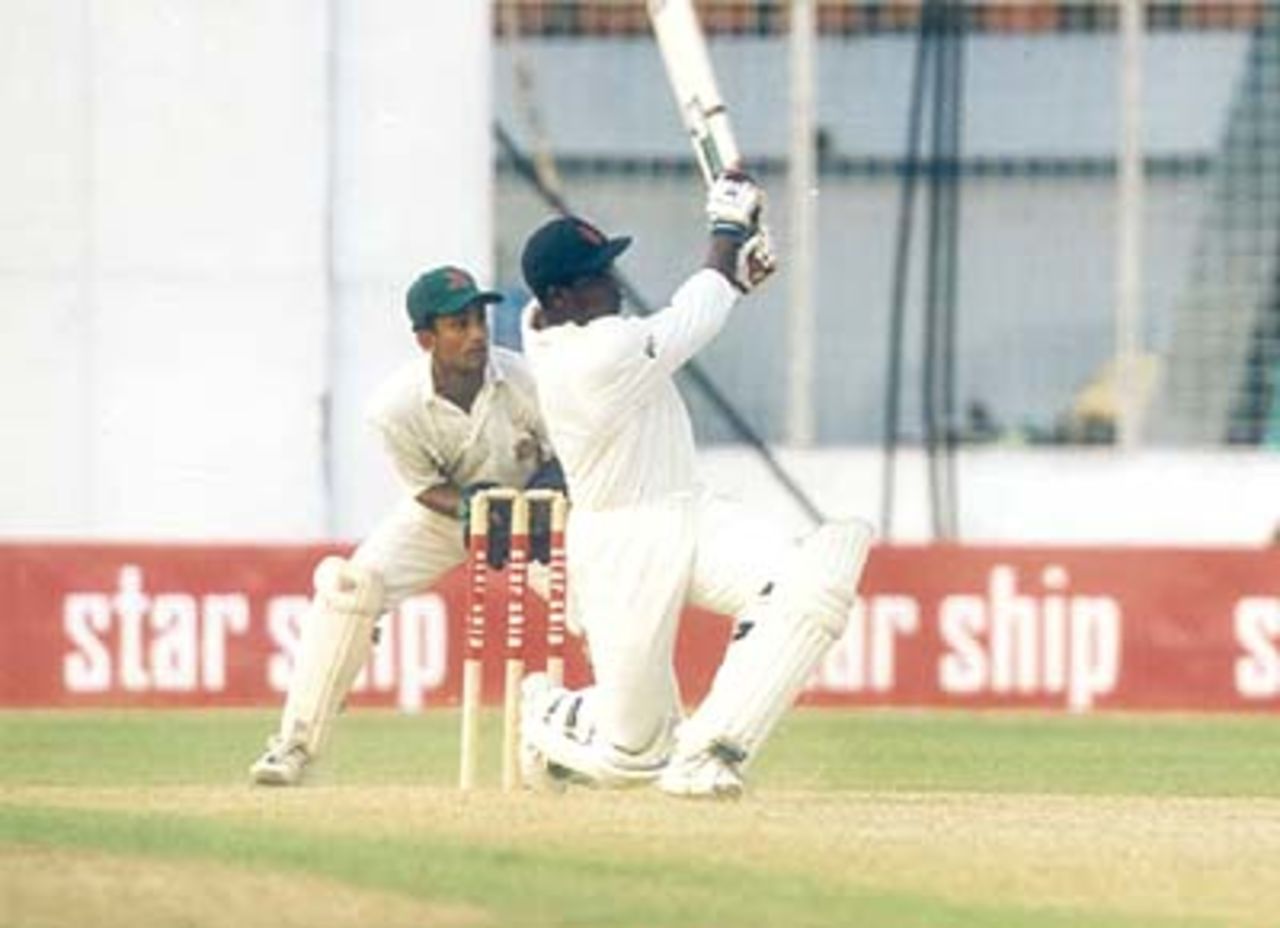 England A skipper Mark Alleyne swings a ball to the boundary in the match against Bangladesh, Bangladesh v England 'A', Bangabandhu National Stadium, Dhaka, (4-day match) 01-04 November 99, England 'A' in Bangladesh, 1999/00