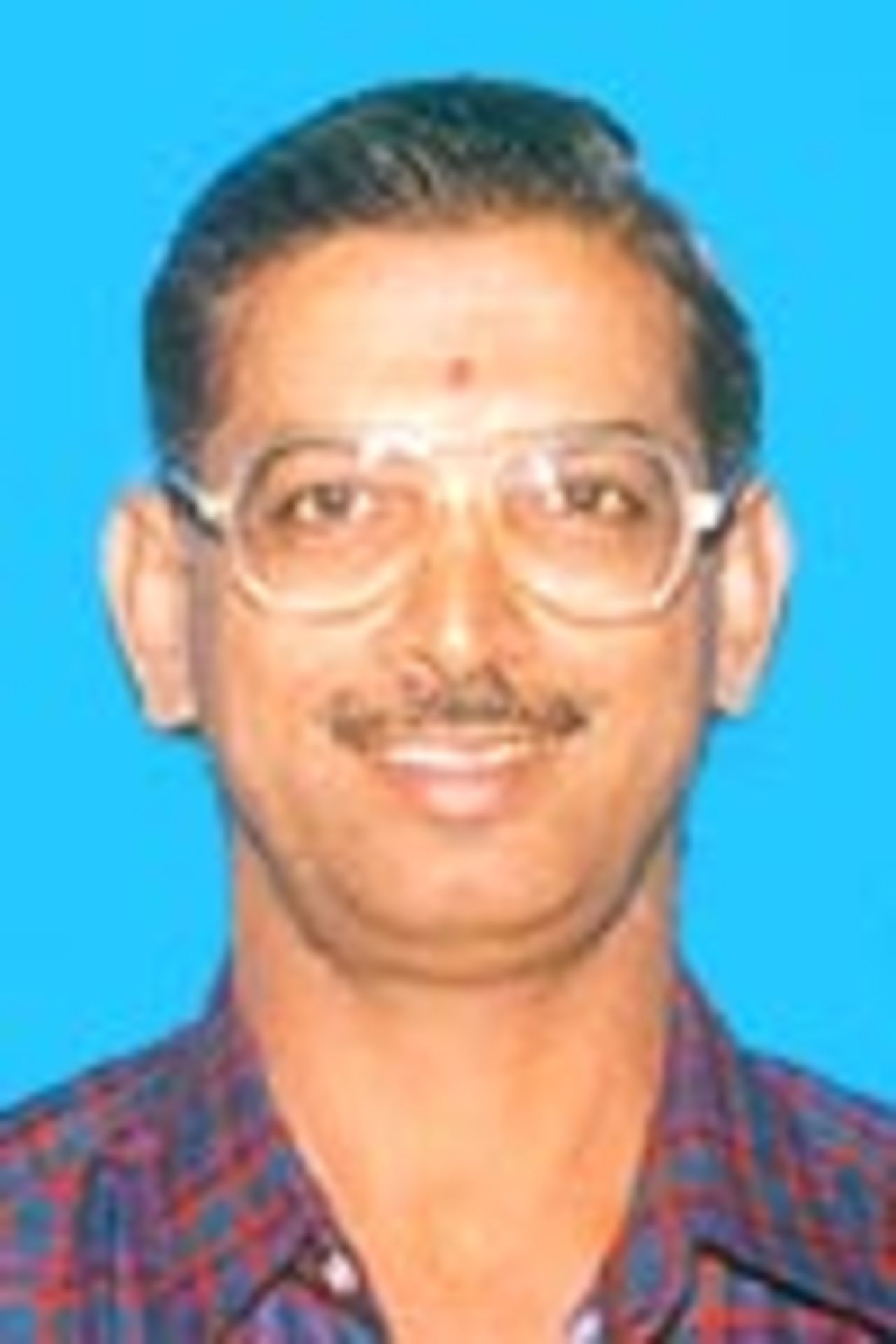 Ravindhron, Umpire, Portrait