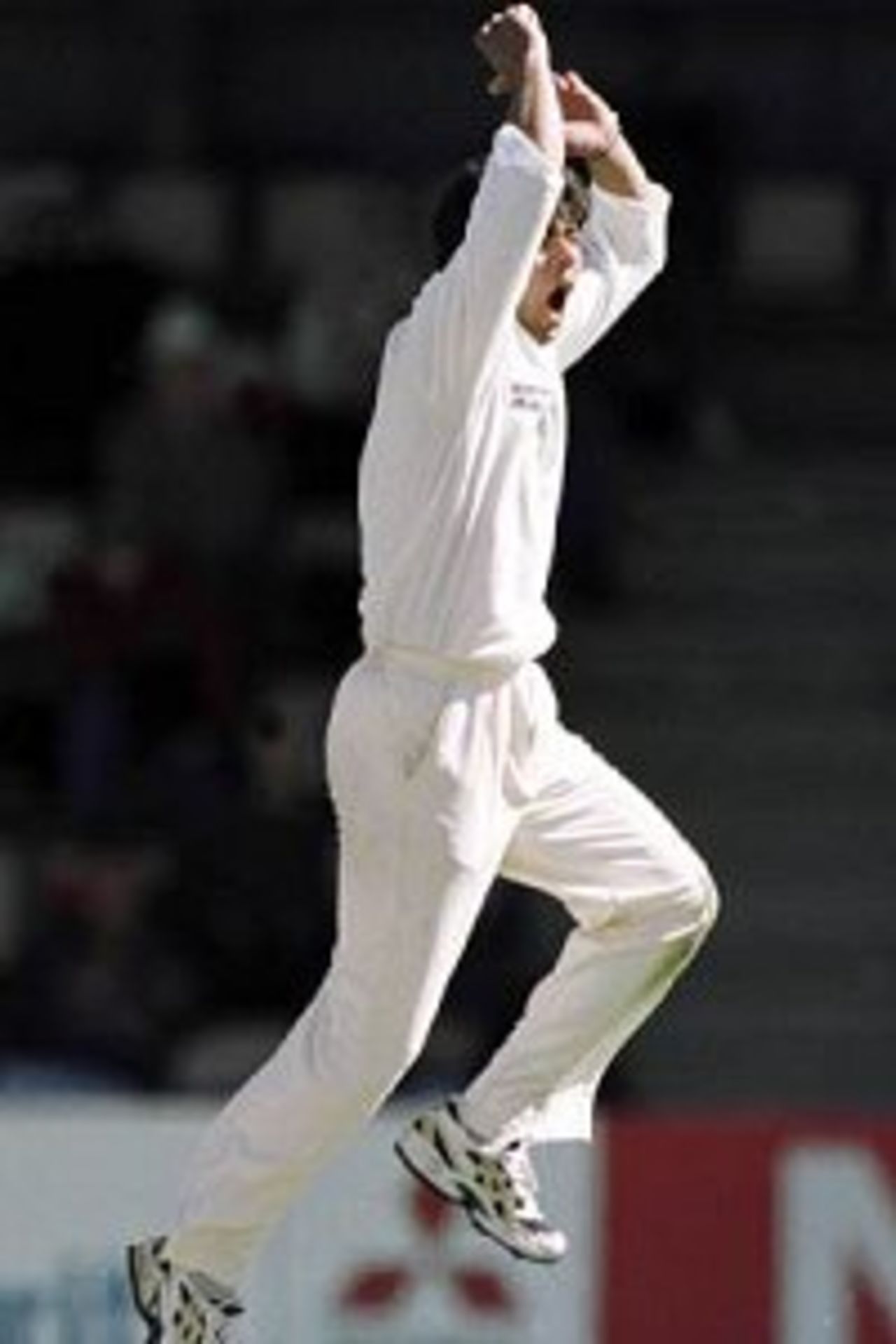 19 Nov 1999: Pakistan spin bowler Saqlain Mushtaq jumps for joy after dismissing Australian batsman Damien Fleming for a duck, during day two of the Second test between Australia and Pakistan at Bellerive Oval, Hobart, Australia. Mushtaq bowled his best ever test figures of six for forty six.