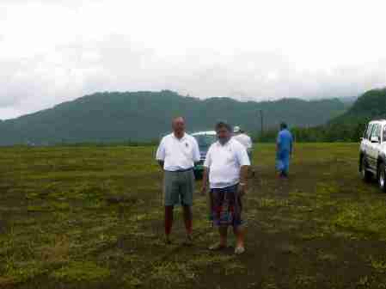 Seb Kohlhase with the Prime Minister of Samoa at the site for the new cricket fields