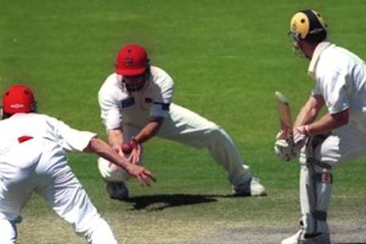19 Nov 1999: Simon Katich, batsman for Western Australia, is caught by David Fitzgerald, fieldsman for South Australia during day two of the Pura Milk Cup Match played between South Australia and Western Australia at the Adelaide Oval.