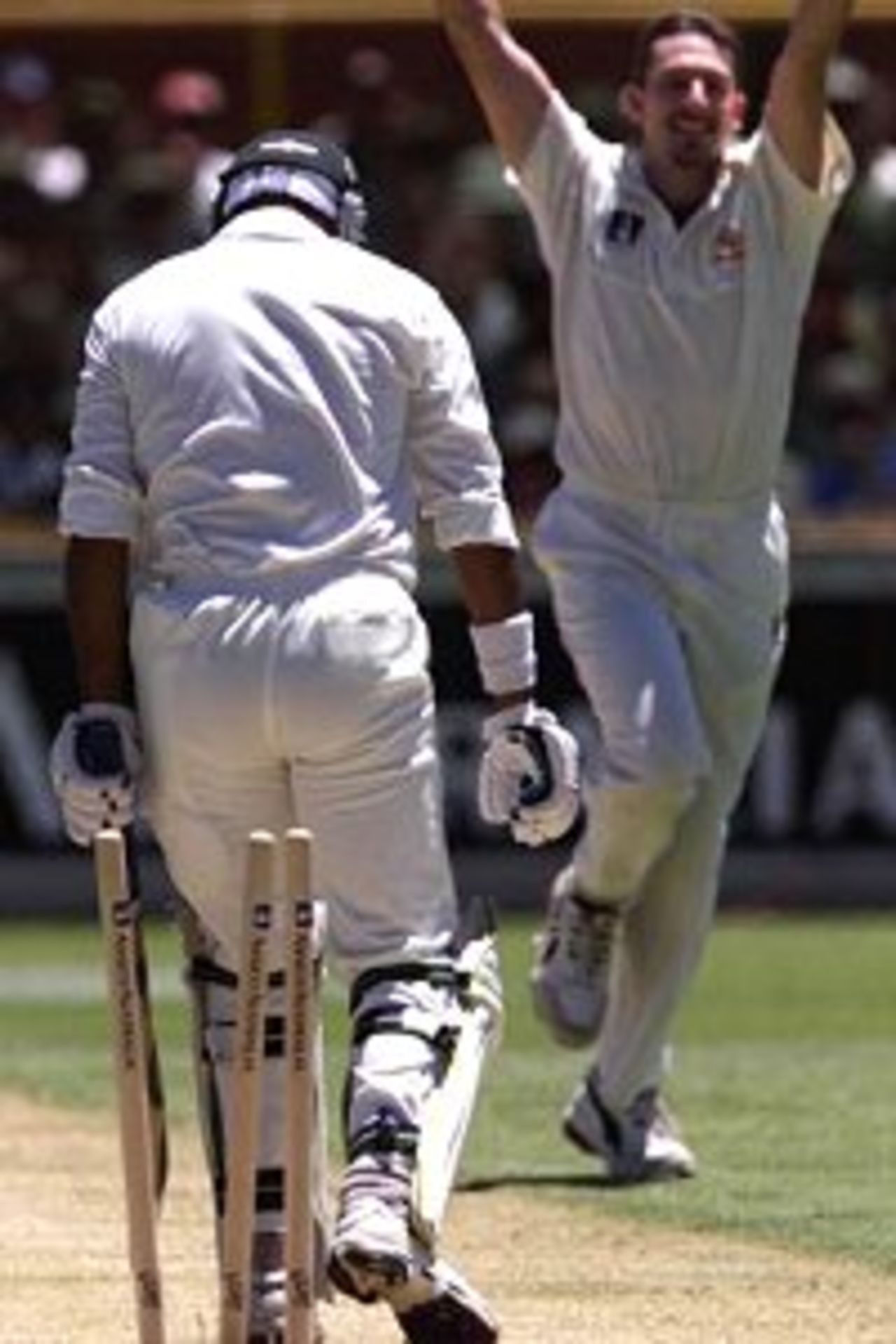 26 Nov 1999: Pakistan batsman Ijaz Ahmed is clean bowled by Australian fast bowler Damien Fleming during day one of the third test played between Australia and Pakistan at the WACA ground in Perth, Western Australia, Australia.