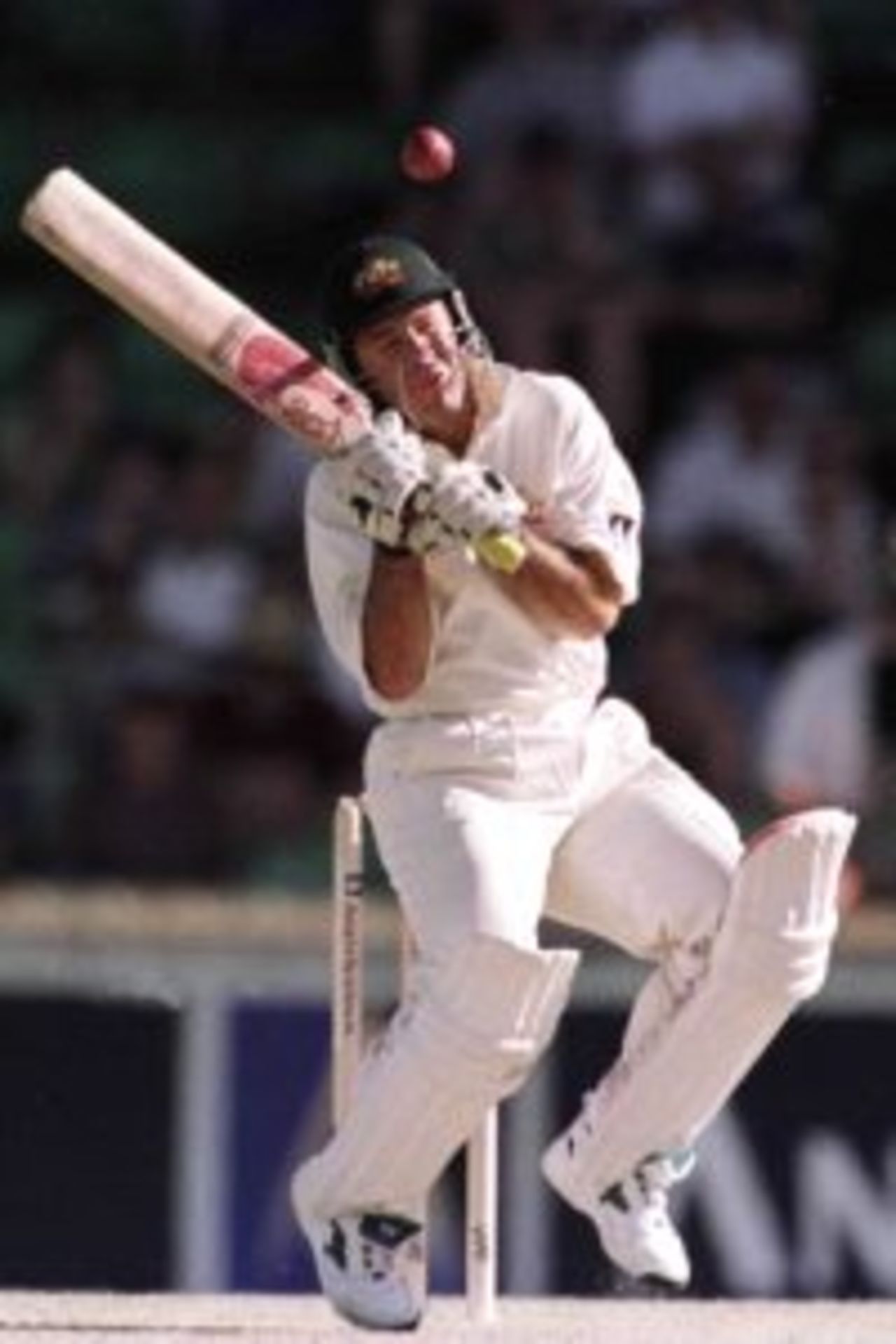 26 Nov 1999: Australian batsman Ricky Ponting avoids a bouncer that was bowled by Pakistan fast bowler Mohammad Akram, during day one of the third test played between Australia and Pakistan at the WACA ground in Perth, Western Australia, Australia. Pakistan were all out today for 155 runs. Australia finished the day on 171 runs for four wickets