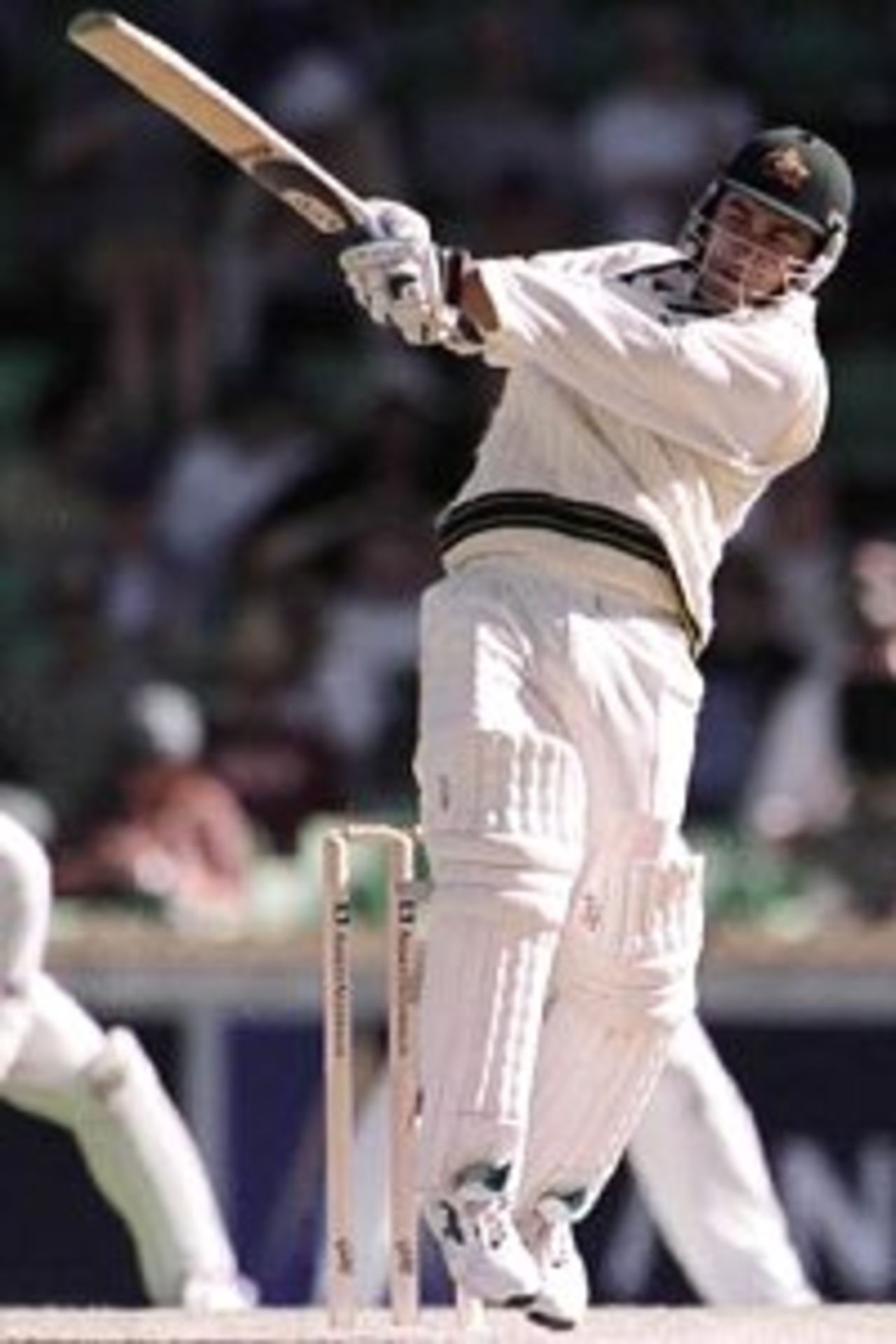 26 Nov 1999: Australian batsman Justin Langer pulls one away to the boundry, during day one of the third test played between Australia and Pakistan at the WACA ground in Perth, Western Australia, Australia. Pakistan were all out today for 155 runs. Australia finished the day on 171 runs for four wickets