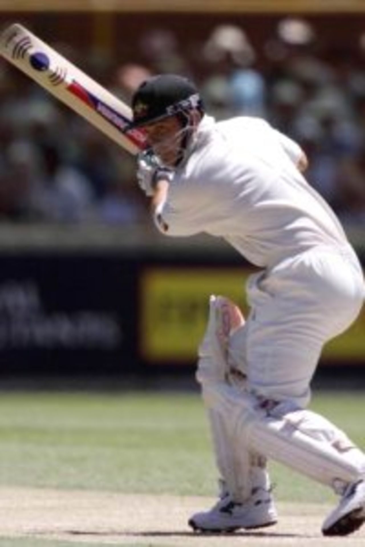27 Nov 1999: Australian batsman Justin Langer cuts one through the slips, during day one of the third test played between Australia and Pakistan at the WACA ground in Perth, Western Australia, Australia.