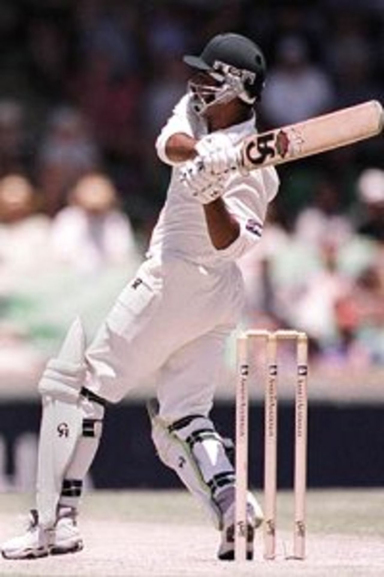 28 Nov 1999: Pakistan batsman Ijaz Ahmed smashes one to the boundry on his way to scoring a century, during day three of the third test played between Australia and Pakistan at the WACA ground in Perth, Western Australia, Australia.