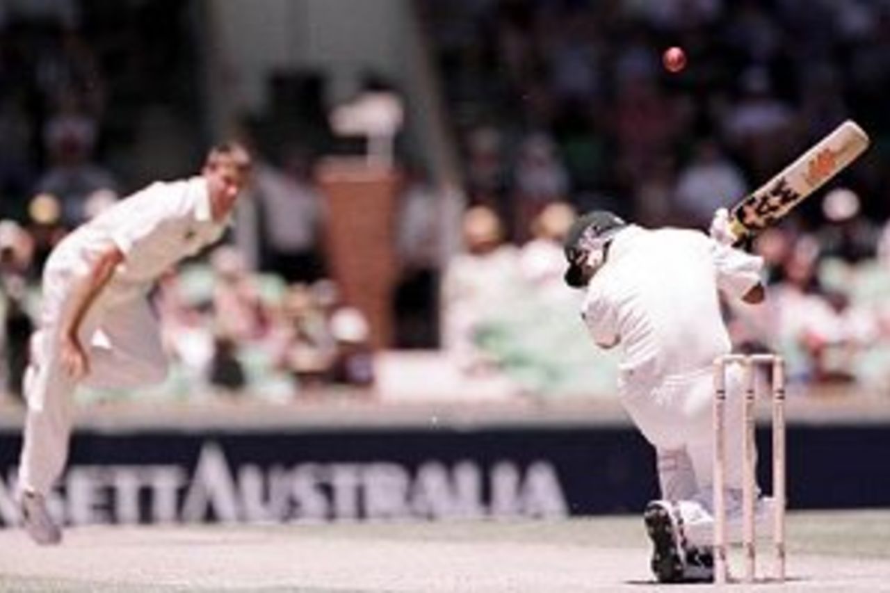 28 Nov 1999: Pakistan batsman Ijaz Ahmed ducks a bouncer bowled ay him by Australian fast bowler Glenn McGrath, during day three of the third test played between Australia and Pakistan at the WACA ground in Perth, Western Australia, Australia.