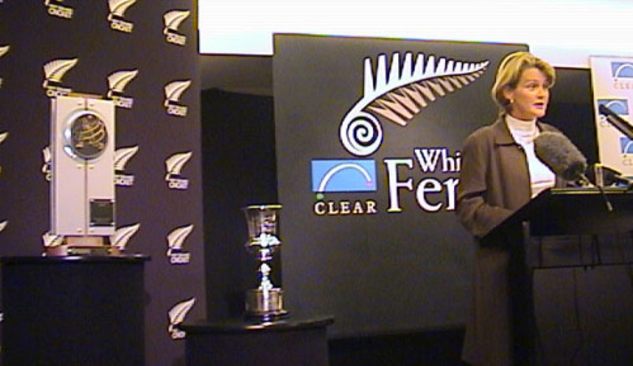 With the CricInfo Women's World Cup 2000 trophy and the perpetual Women's World Cup trophies on display nearby, convenor of selectors Lesley Murdoch speaks at the naming of the New Zealand women's team to contest the CricInfo Women's World Cup 2000