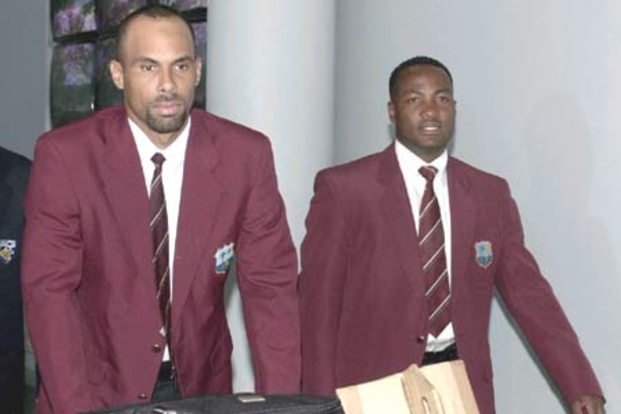4 Nov 2000: James Adams (captain) and Brian Lara of the West Indies cricket team arrive this morning into Perth, as the West Indies begin preparations for their test series against Australia. Perth International Airport, Perth, Australia.