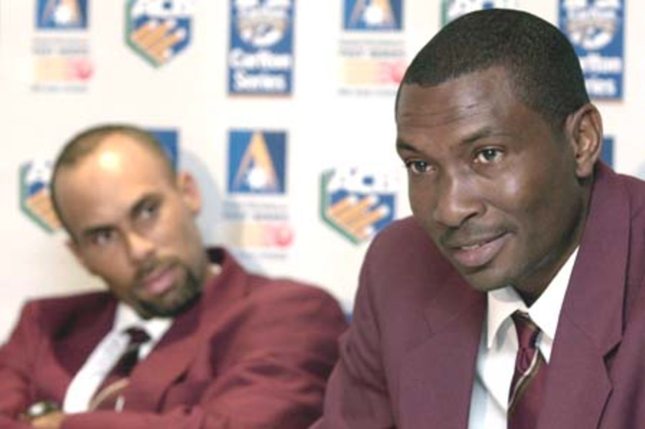 4 Nov 2000: Roger Harper coach of the West Indies cricket team talks to the media as Jimmy Adams, captain of the team, listens in during their press conference today at the Holiday Inn, Perth, Australia.