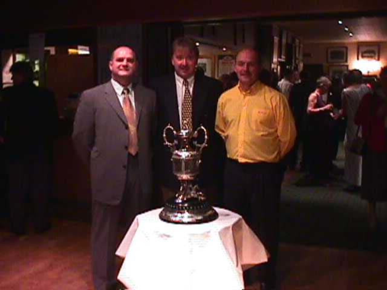 Bacup officials pose with the Championship Trophy