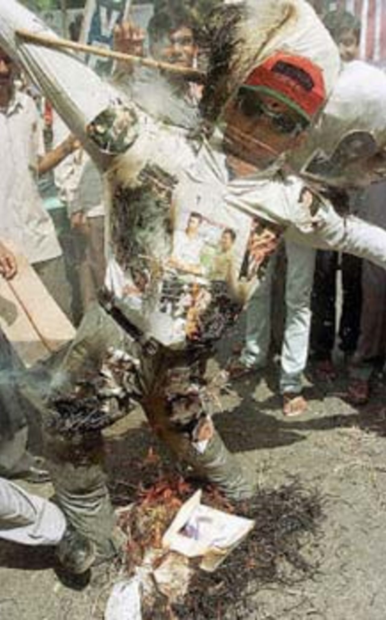 Members of the students wing of Bharatiya Janata Party (BJP) burn an effigy of Indian cricketeer Ajay Jadeja along with four other Indian players after holding a mock public trial that sentenced them to death during a demonstration in  Bangalore 06 November 2000. Five Indian cricket players Ajay  Jadeja,Manoj Prabhakar, Ajay Sharma, Mohammad Azharuddin  and Nayan Mongia have been banned from the game by  India's cricket board after Central Bureau of Investigation (CBI) named them along with other international cricket players in their match-fixing report.