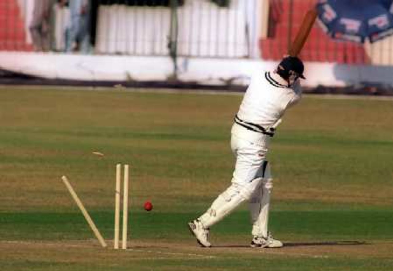 Kabir Khan's leg stump flies as he tries to play a cross shot, Governor's XI v England XI at Peshawar, 8-11 Nov 2000