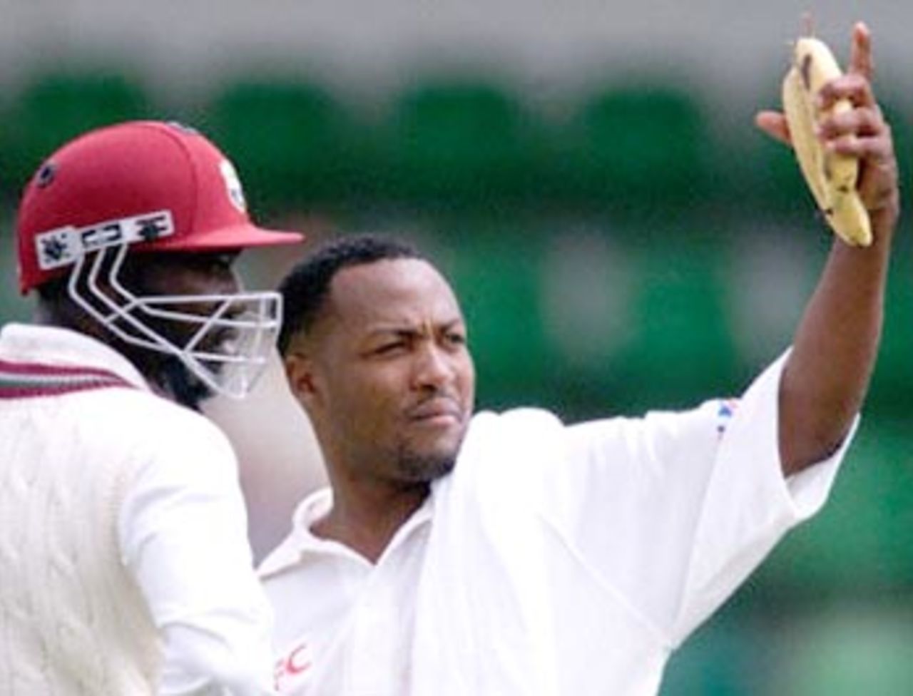 Controversial West Indies cricketer Brian Lara (R) gestures to the changerooms, alongside batsman Courtney Browne (L) during a drinks break in a four day game against the Western Warriors (a West Australian state side) at the WACA ground in Perth 09 November. Lara has been rested in this game, with the West Indies currently on 9 for 132.