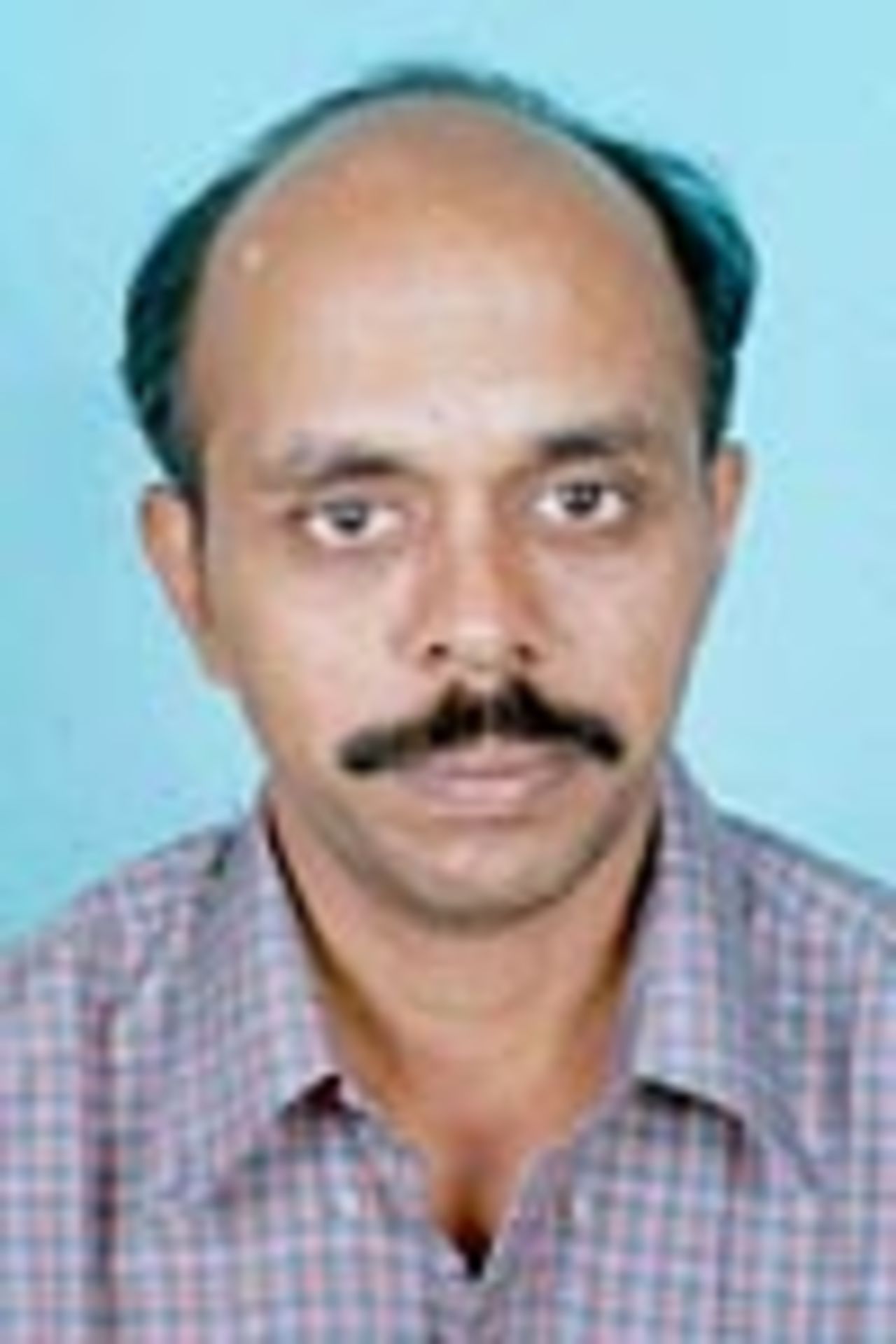 P Chandrasekharan, Umpire, Portrait