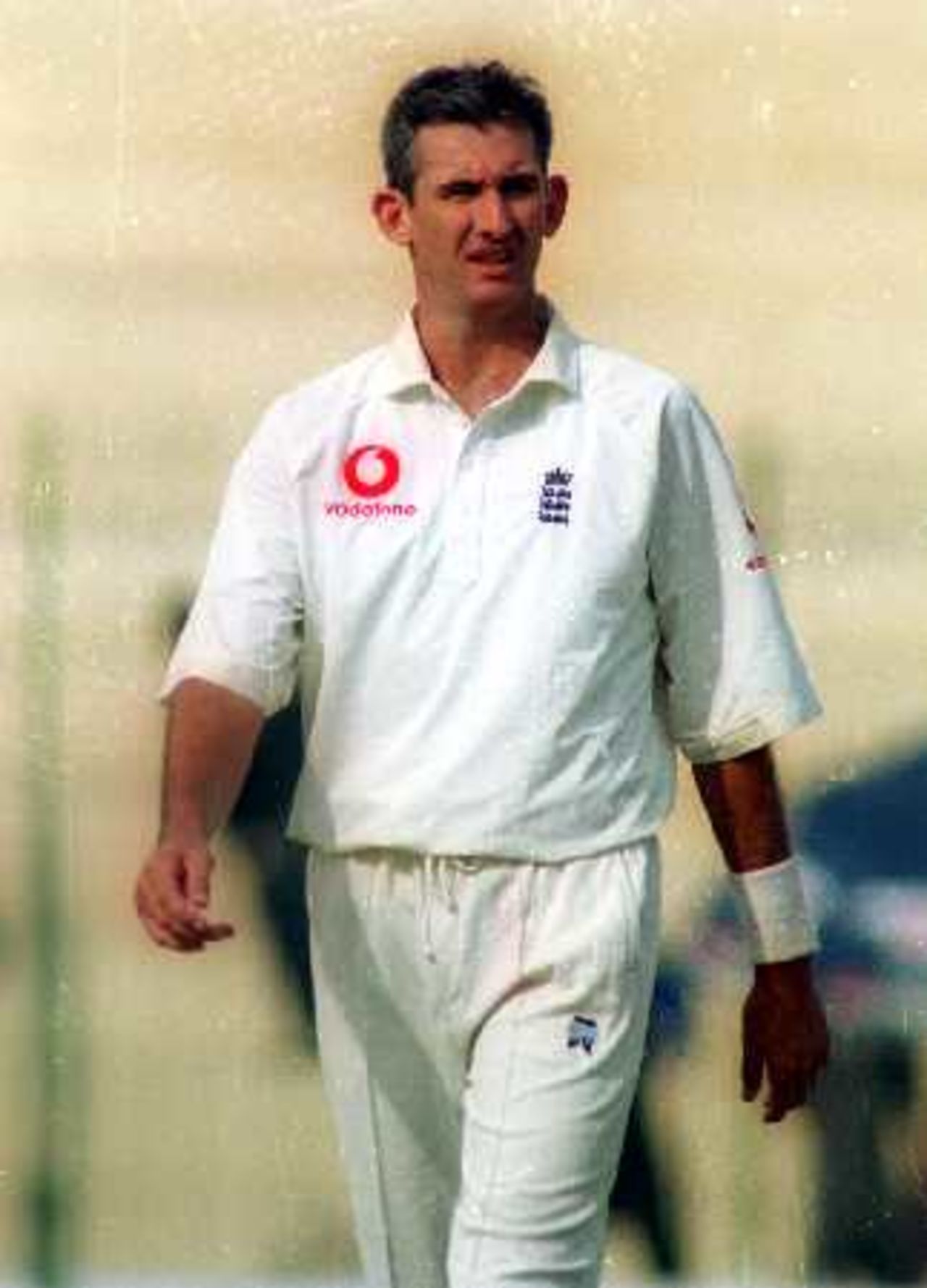 Andy Caddick walking back to his bowling mark, Governor's XI v England XI at Peshawar, 8-11 Nov 2000