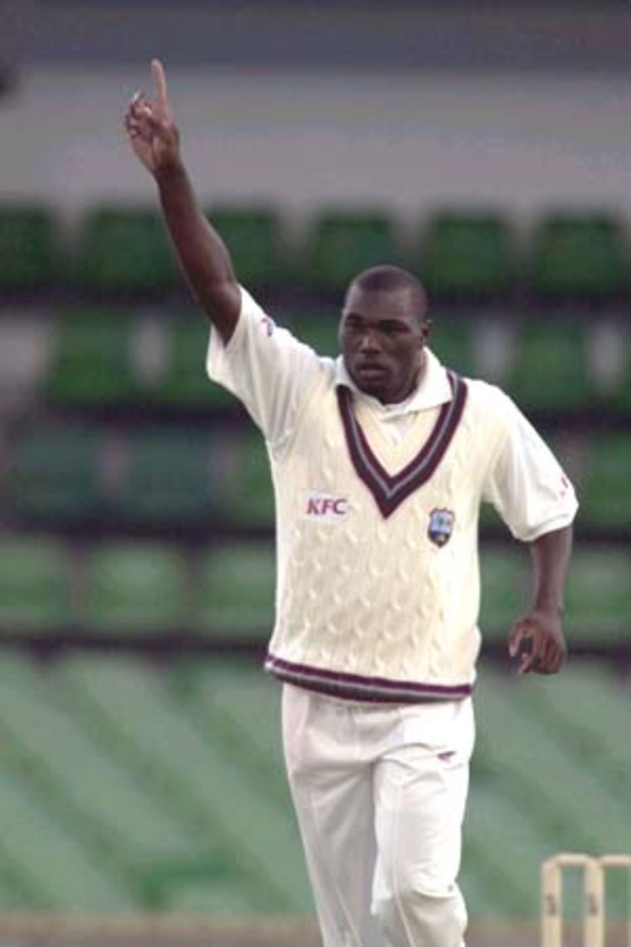 09 Nov 2000: Marlon Black for the West Indies gets the wicket of Mike Hussey for Western Australia in the match between the Western Warriors and the West Indies at the WACA ground in Perth, Australia.