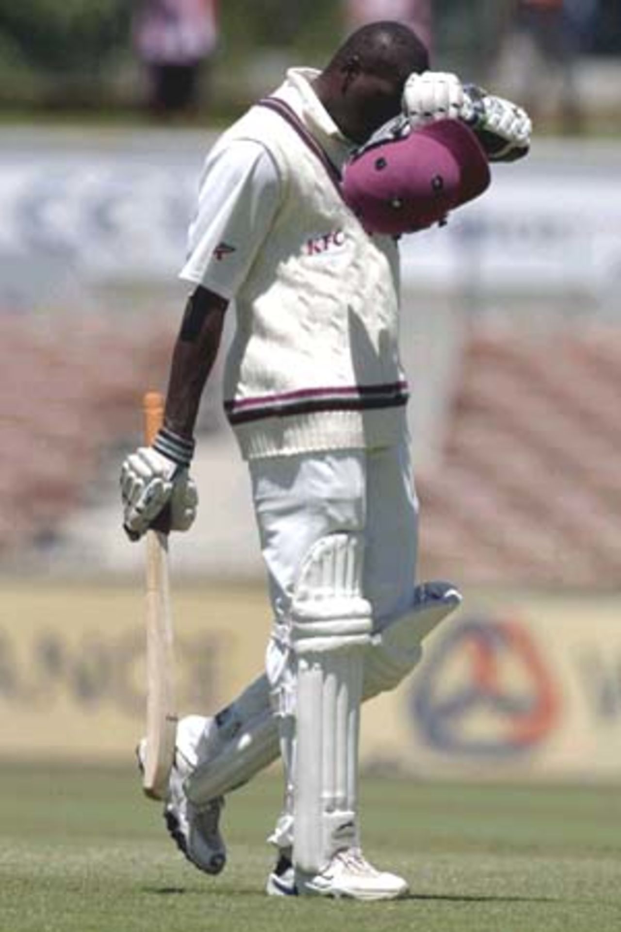 11 Nov 2000: Marlon Black of the West Indies leaves the pitch after being caught by Damian Martyn off the bowling of Matthew Nicholson for 3 in the match between the Western Warriors and the West Indies at the WACA ground in Perth, Australia.