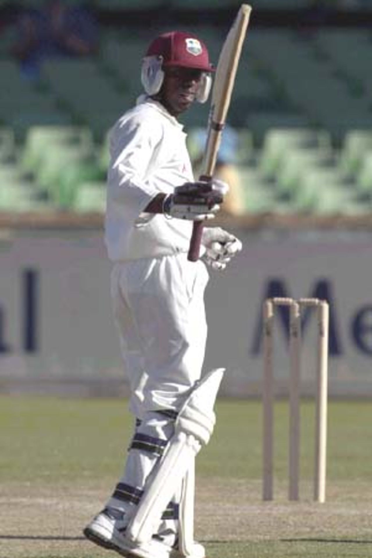 11 Nov 2000: Sherwin Campbell of the West Indies waves to team mates after getting his 100 in the match between the Western Warriors and the West Indies at the WACA ground in Perth, Australia