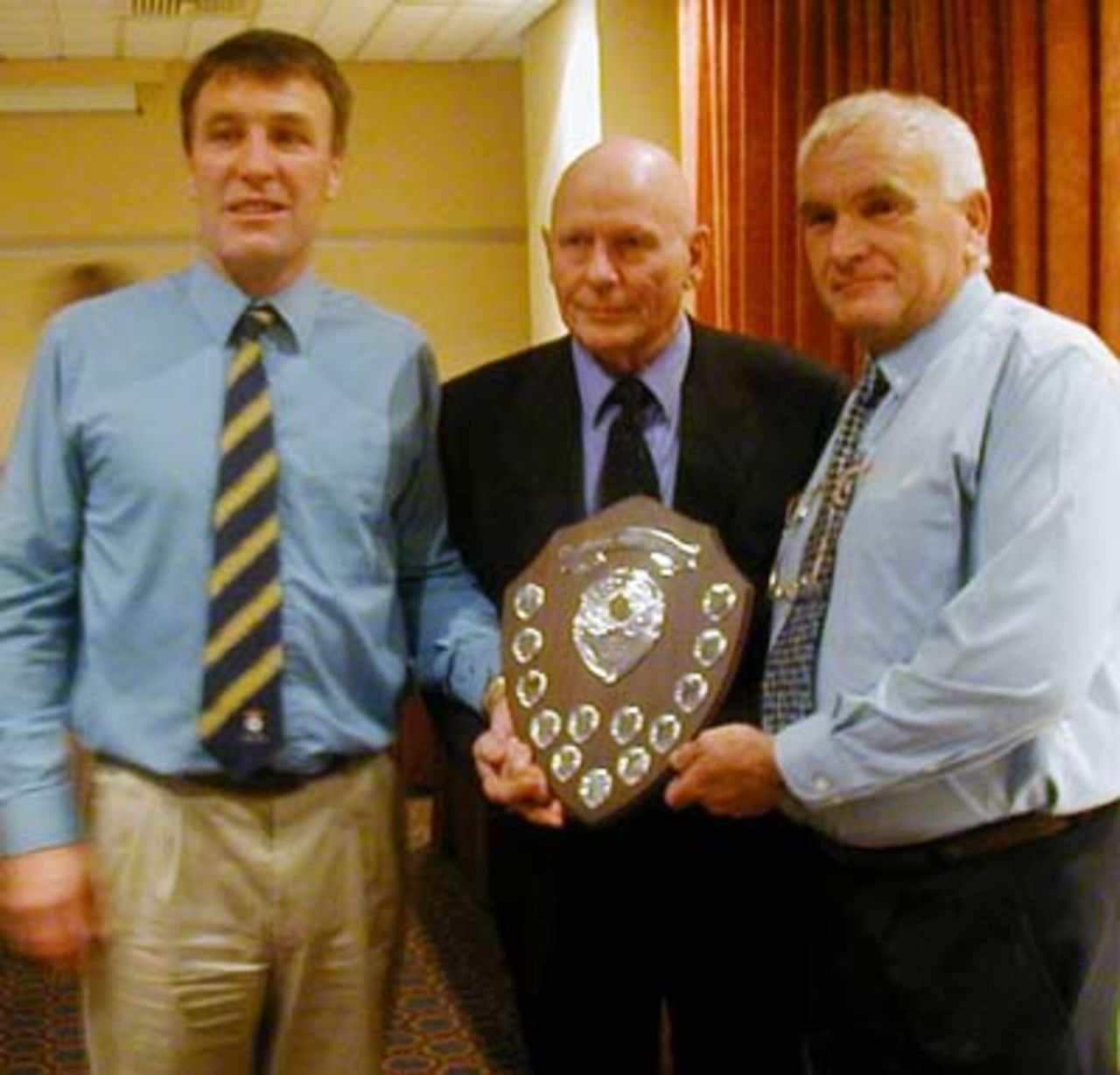 Alan Spencer and John Pallister of Lymington receive the award for the