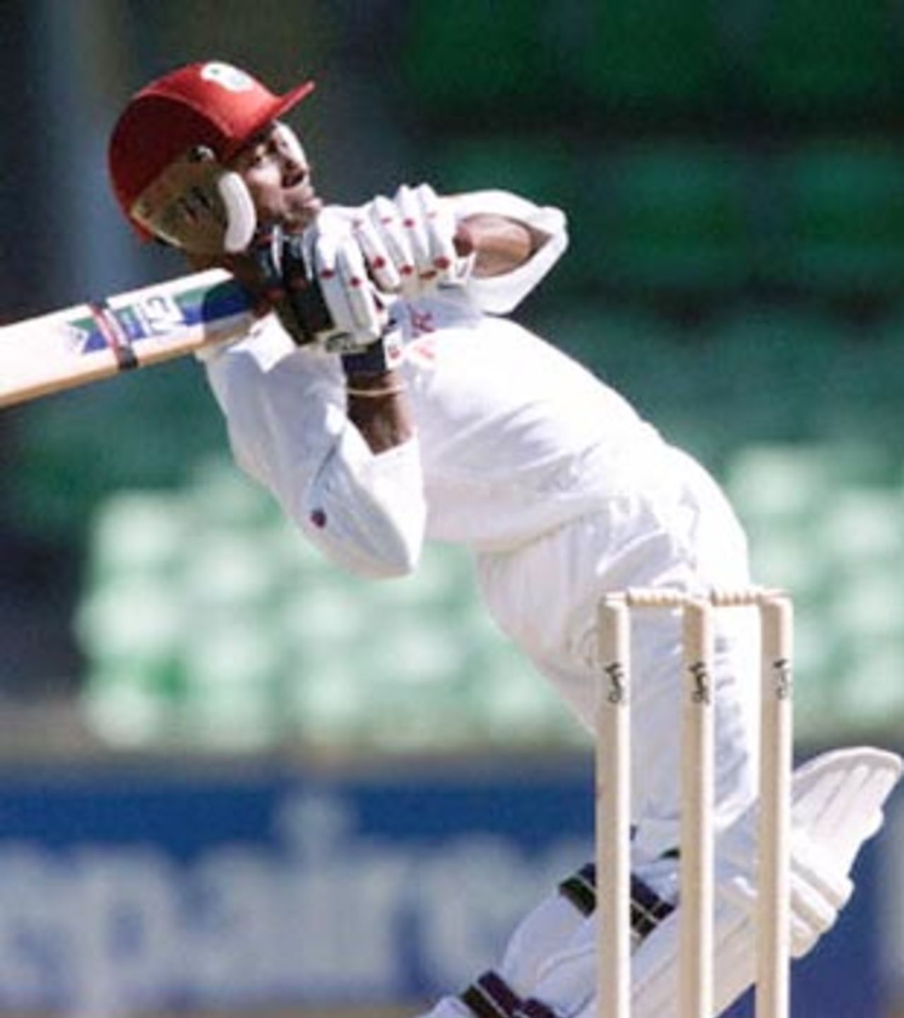 West Indies batsman and vice-captain Sherwin Campbell sways back as he avoids a bouncer from bowler Gavin Swan during a four day match against the Western Warriors at the WACA ground in Perth 11 November 2000. Campbell is currently 82 not out, with the West Indies 4-181 at tea.