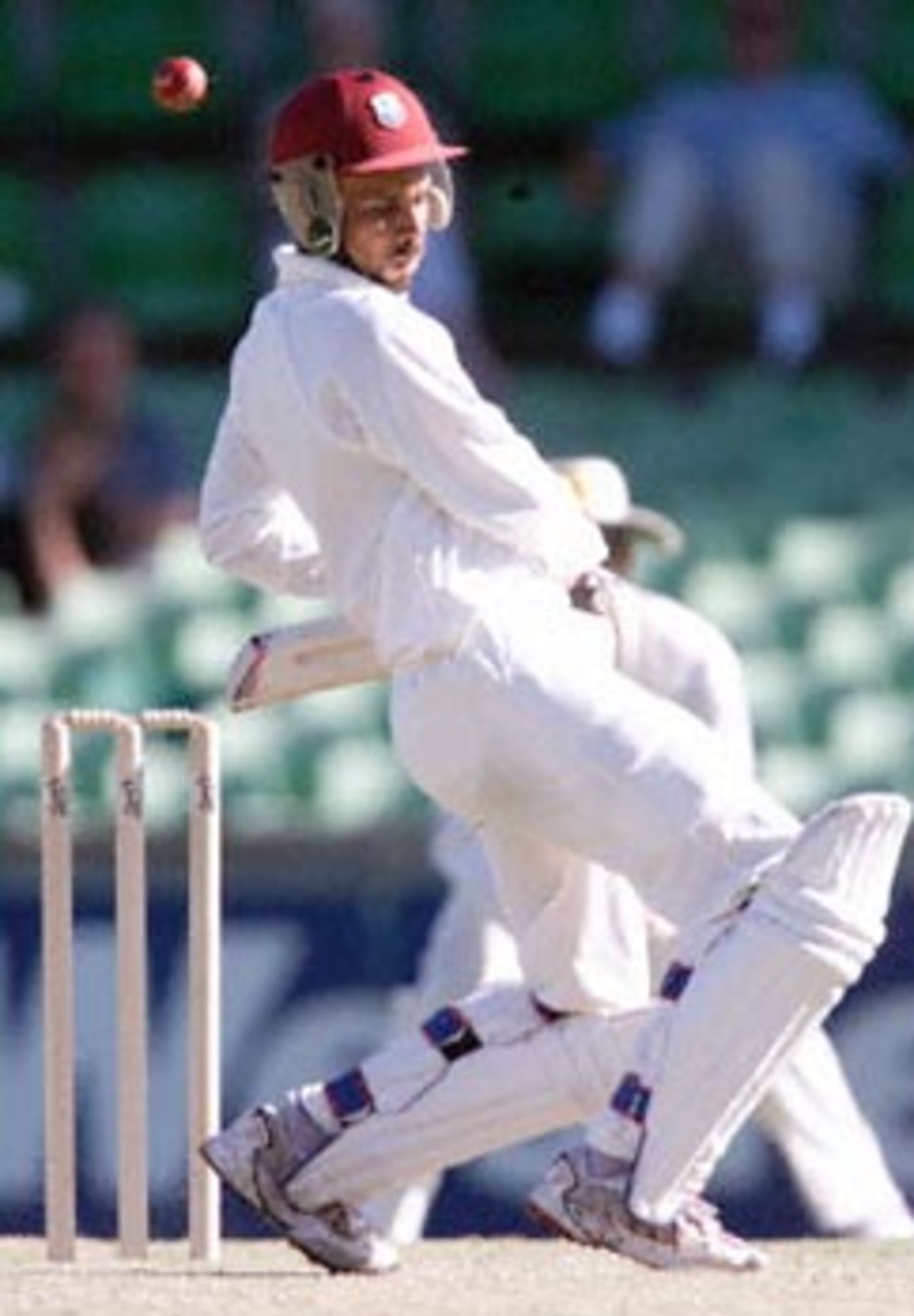 West Indies captain Jimmy Adams sways away from a bouncer during a four day match against the Western Warriors at the WACA ground in Perth 11 November 2000. The West Indies are currently on 6-266 at stumps on day three, with Adams not out on 41.