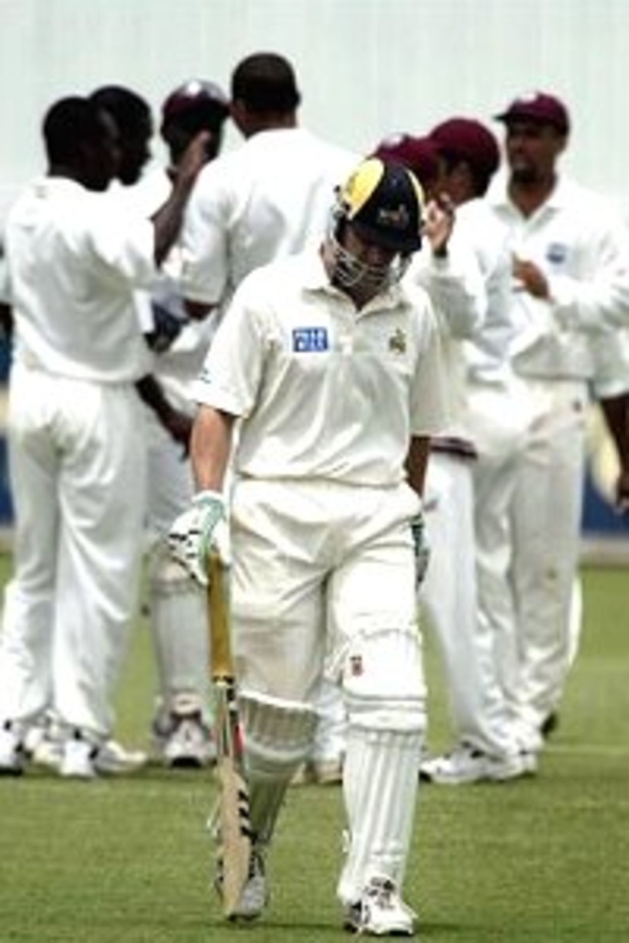12 Nov 2000: Adam Gilchrist leave the field after being dimissed by Mervyn Dillon of the West Indies in the match between the Western Warriors and the West Indies at the WACA ground in Perth, Australia.